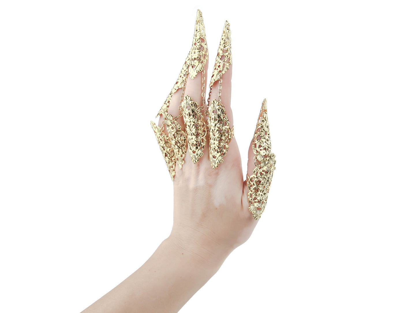 A hand elegantly displays Myril Jewels' full set of intricate gold rings with nail claws, perfect for neo-gothic style enthusiasts. The exquisite craftsmanship is ideal for Halloween, punk fashion statements, or as a standout accessory for whimsigoth and witchcore looks, also making a memorable gift for a goth girlfriend.
