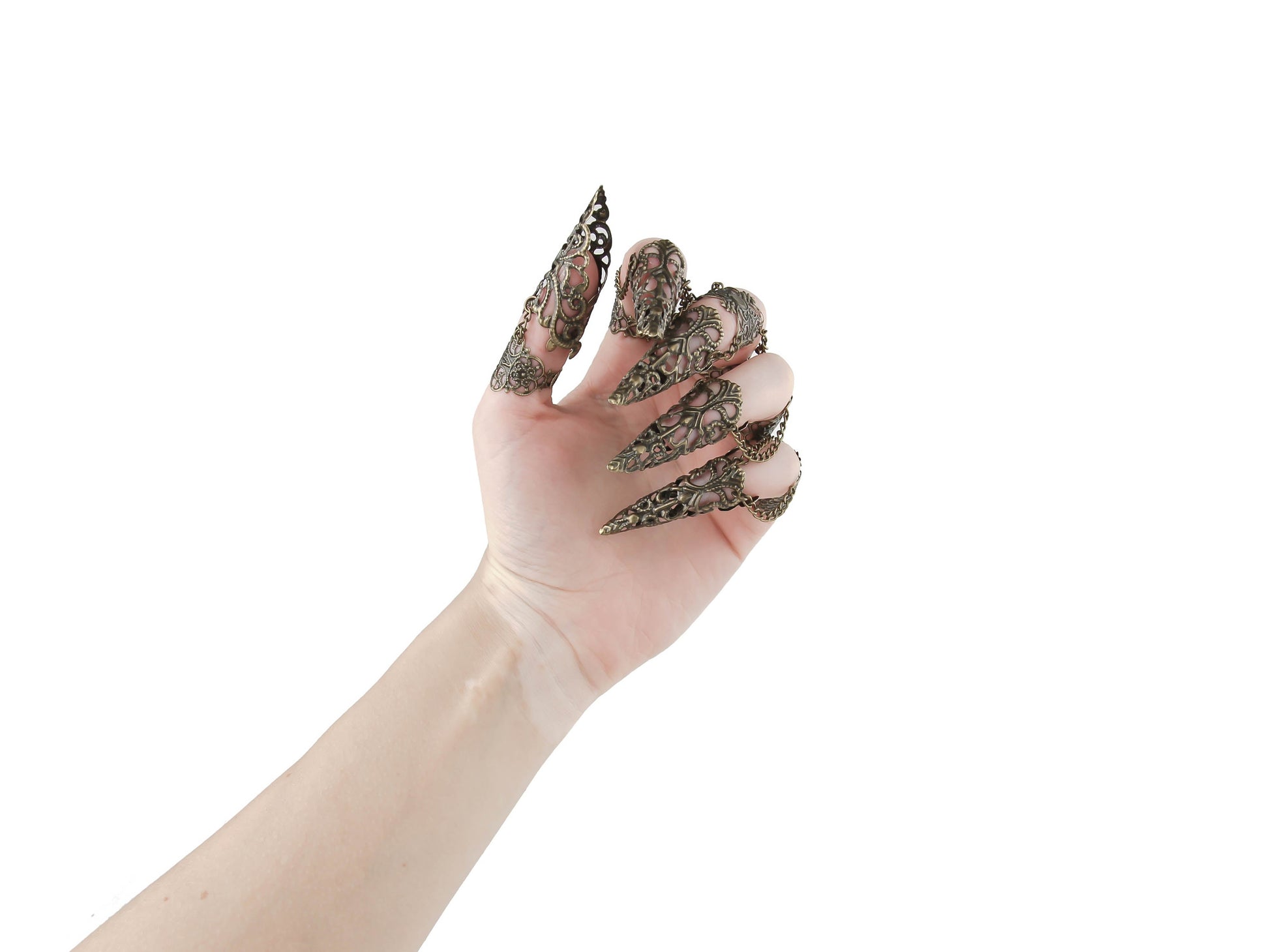 A striking set of bronze full-hand claw rings from Myril Jewels graces each finger with neo-goth intricacy. Designed for the dark-avantgarde and alternative style aficionado, these rings with claws are perfect for adding an edgy touch to Halloween or everyday minimal goth attire. The elaborate filigree work showcases the brand's commitment to gothic-chic elegance, making these claws a must-have for any witchcore, rave party, or festival jewel collection.