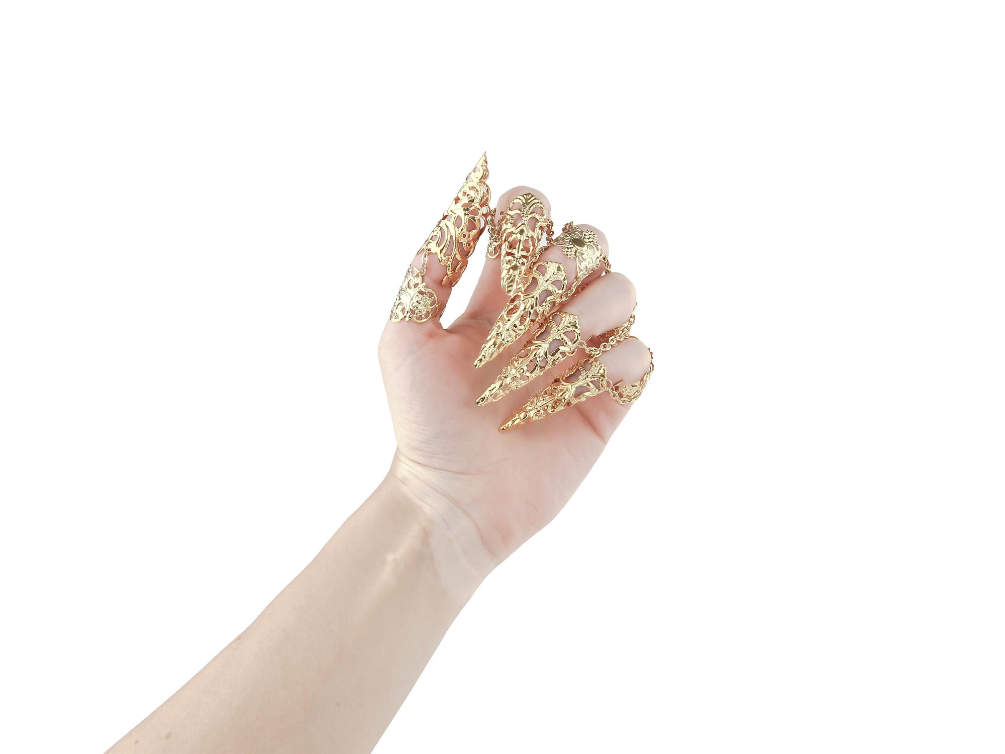 A hand is elegantly outfitted with a full set of Myril Jewels gold claw rings, showcasing a sophisticated neo-goth design. Each finger is graced with an ornate, gold filigree claw ring, exuding a dark-avantgarde and gothic-chic aesthetic. These lavish rings with claws are a perfect match for the alternative style lover, making a dramatic statement for Halloween, enhancing a minimal goth attire, or adding an edge to rave party and festival ensembles.