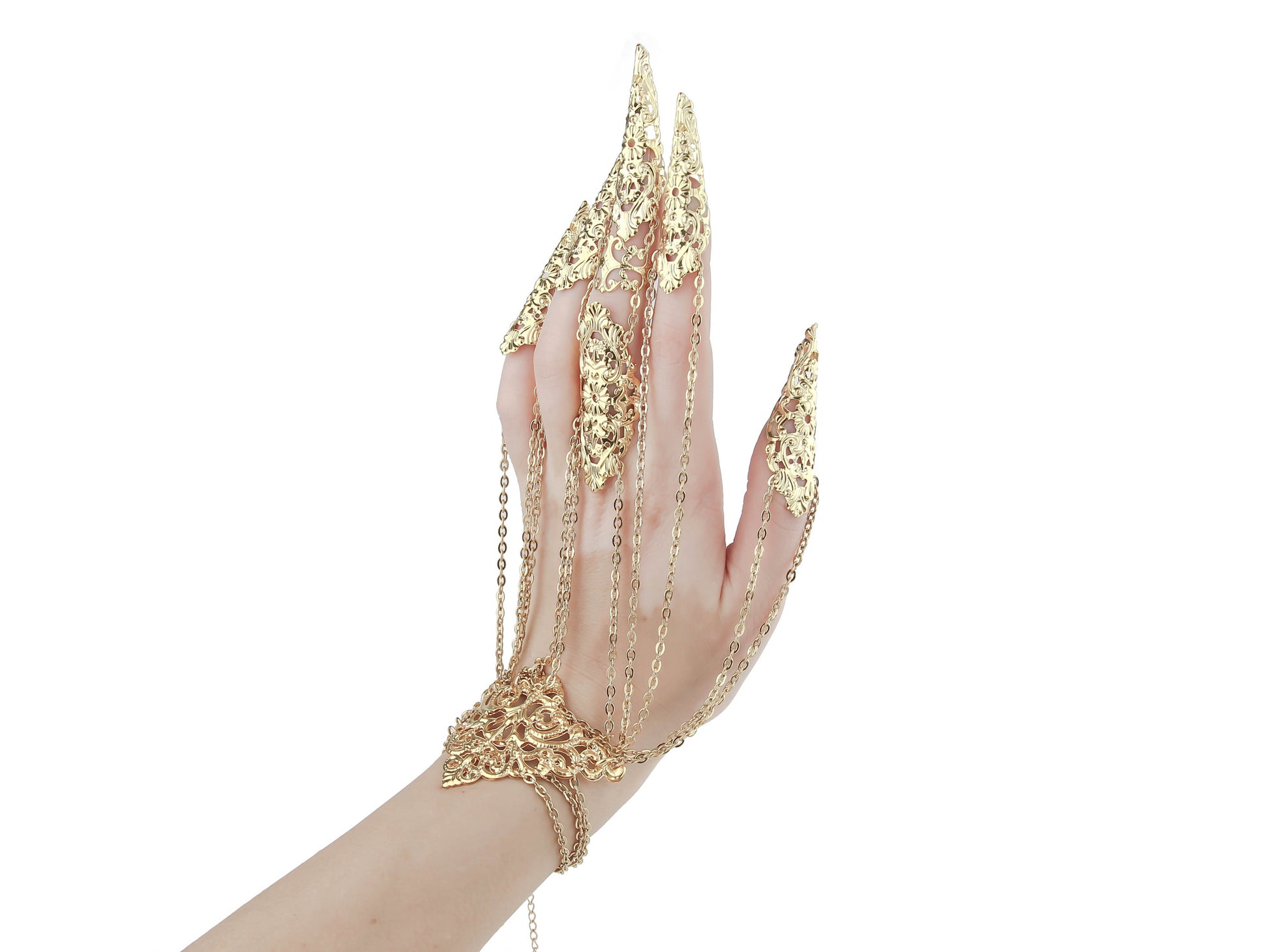 An elegant hand displays a Myril Jewels gold hand chain bracelet with intricate gold claws, epitomizing the neo-goth style. This piece is perfect for those who favor dark avant-garde accessories, blending Halloween and gothic-chic aesthetics for a unique statement in everyday or festival attire