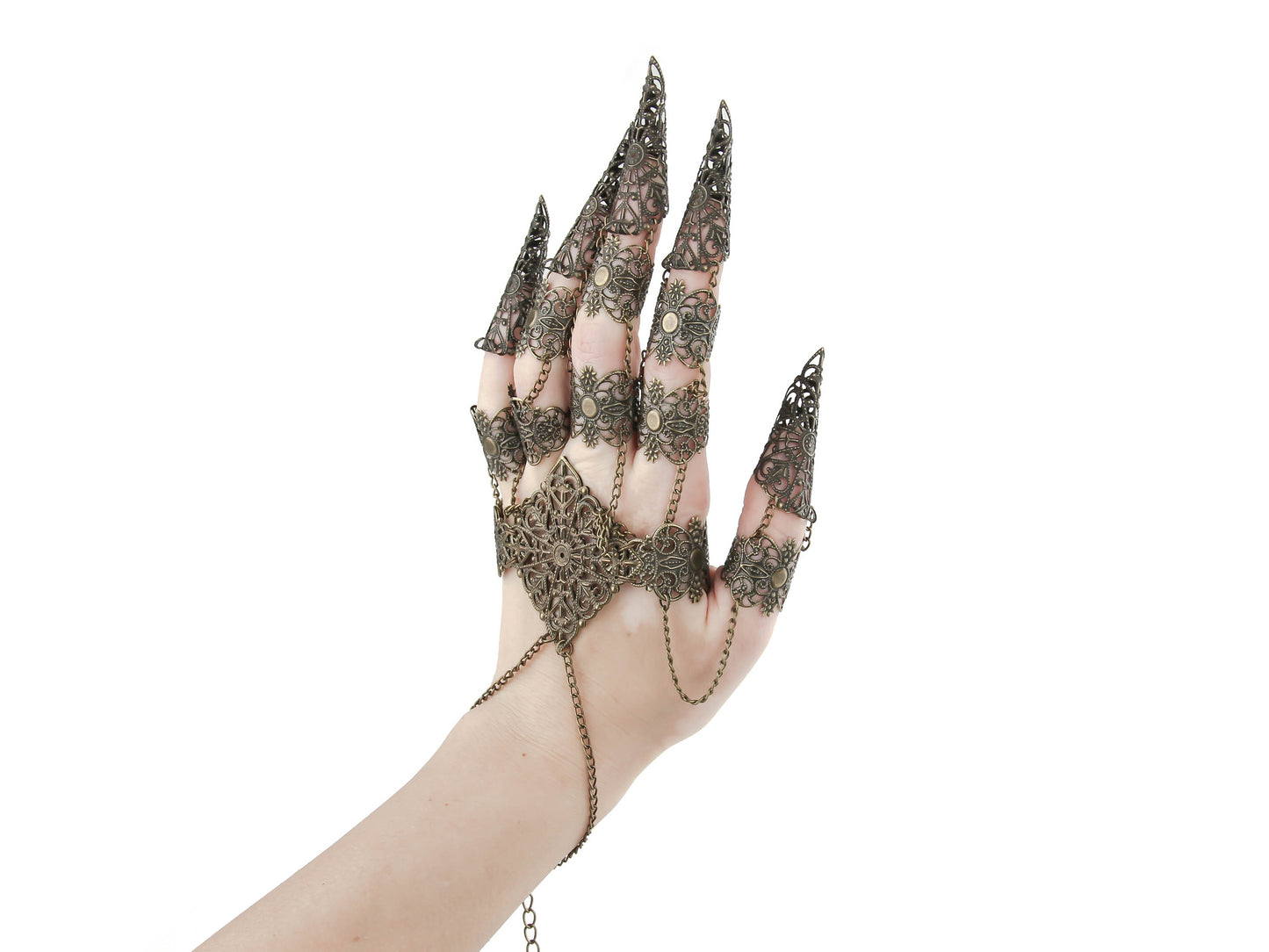 Elevate your style with Myril Jewels' full hand metal glove, featuring ornate bronze claw rings. This neo-gothic creation is perfect for those who love dark, avant-garde jewelry, making it an ideal choice for Halloween, rave parties, or as a distinctive gift for the goth girlfriend.