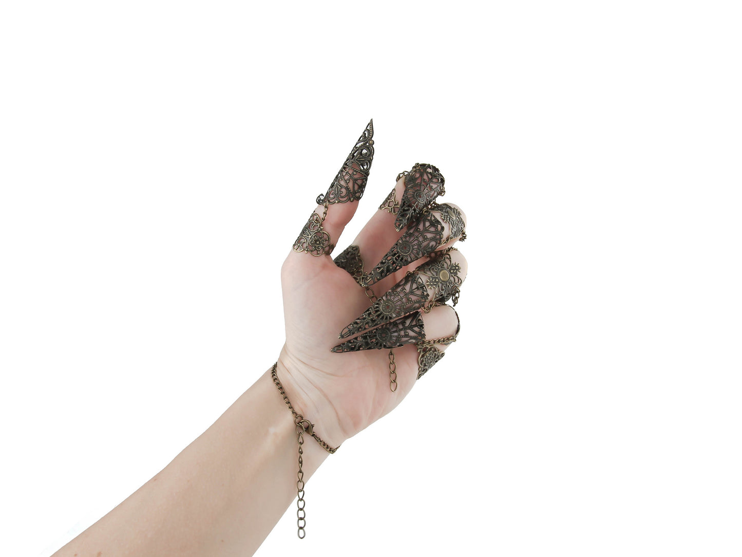 Elevate your style with Myril Jewels' full hand metal glove, featuring ornate bronze claw rings. This neo-gothic creation is perfect for those who love dark, avant-garde jewelry, making it an ideal choice for Halloween, rave parties, or as a distinctive gift for the goth girlfriend.