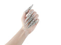 A full hand set of Myril Jewels' extra long nail claw rings create an impactful neo-gothic statement. These claws are the epitome of dark avant-garde jewelry, perfect for gothic enthusiasts seeking bold, witchcore-inspired accessories for everyday wear, Halloween, or festival outfits