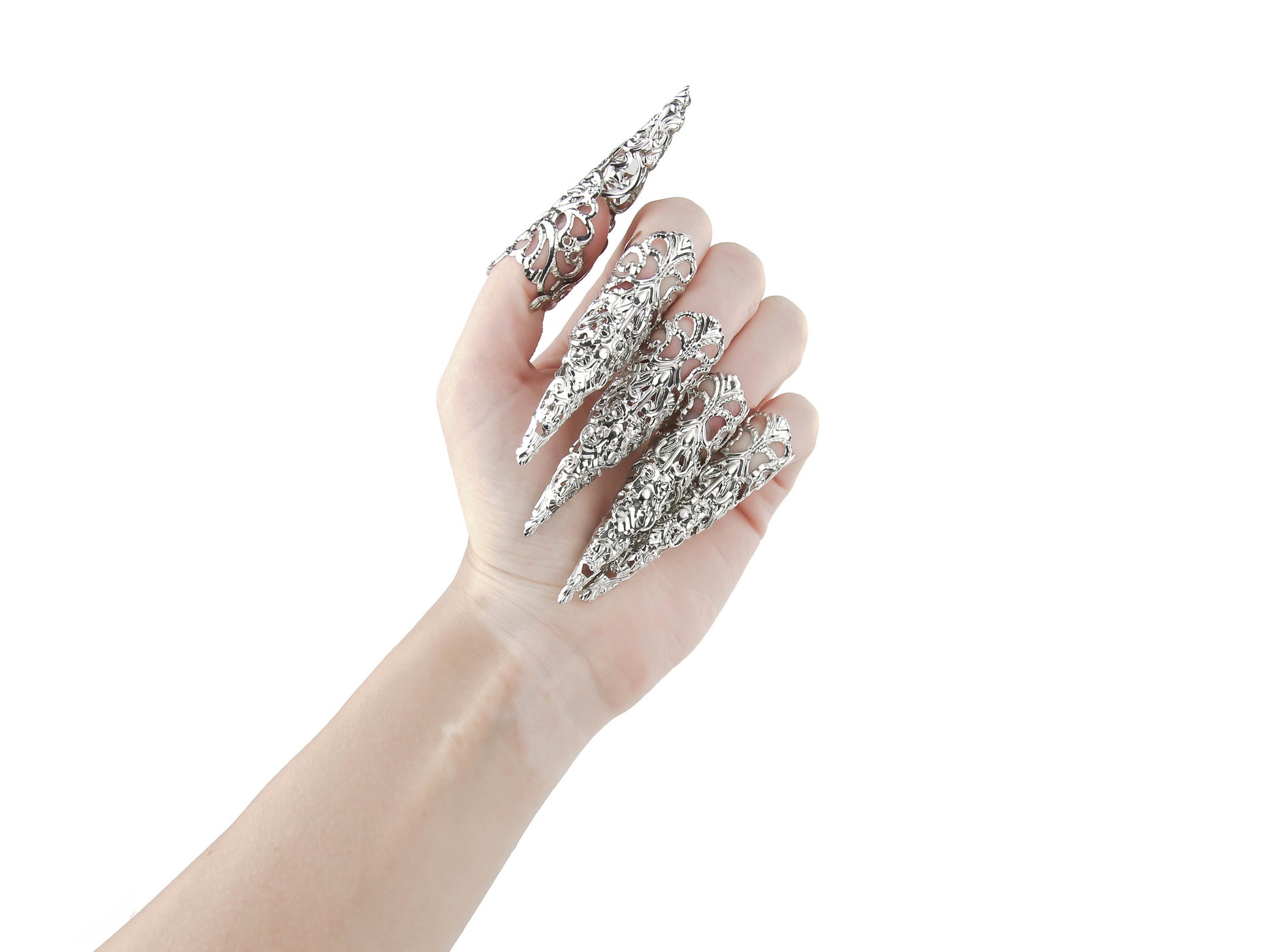 A full hand set of Myril Jewels' extra long nail claw rings create an impactful neo-gothic statement. These claws are the epitome of dark avant-garde jewelry, perfect for gothic enthusiasts seeking bold, witchcore-inspired accessories for everyday wear, Halloween, or festival outfits
