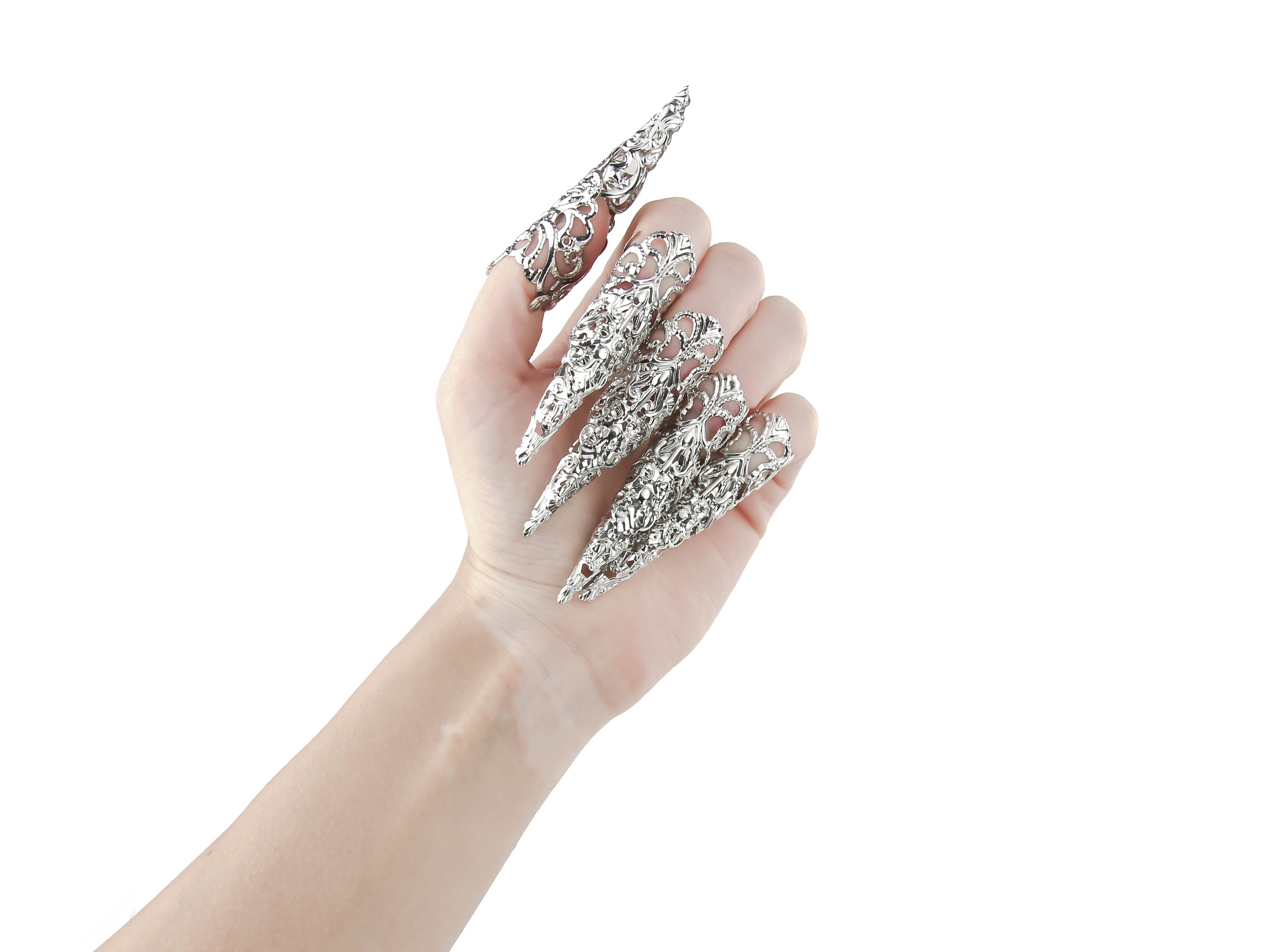 A full hand set of Myril Jewels' extra long nail claw rings create an impactful neo-gothic statement. These claws are the epitome of dark avant-garde jewelry, perfect for gothic enthusiasts seeking bold, witchcore-inspired accessories for everyday wear, Halloween, or festival outfits