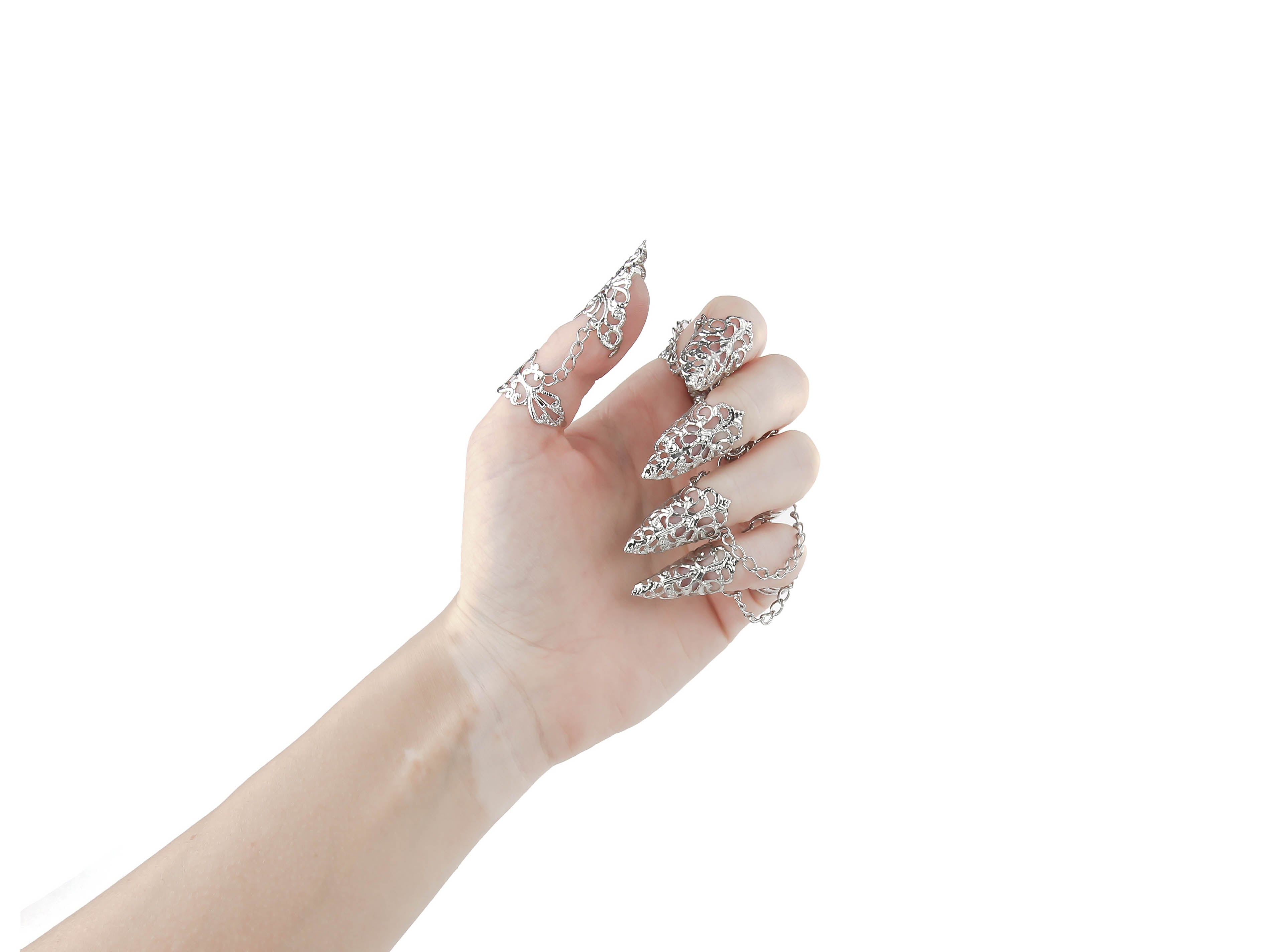  Displayed is a stunning full hand set of Myril Jewels claw rings, designed for the dark-avantgarde enthusiast. The rings feature intricate silver filigree that delicately wraps around each finger, culminating in sharp, claw-like tips, perfect for a Gothic-chic or Witchcore look. These handcrafted pieces are ideal for Halloween, adding a bold statement to minimal goth daily wear, and are a dazzling choice for rave party jewelry or festival adornment, reflecting the unique artistry of Neo Gothic jewels.