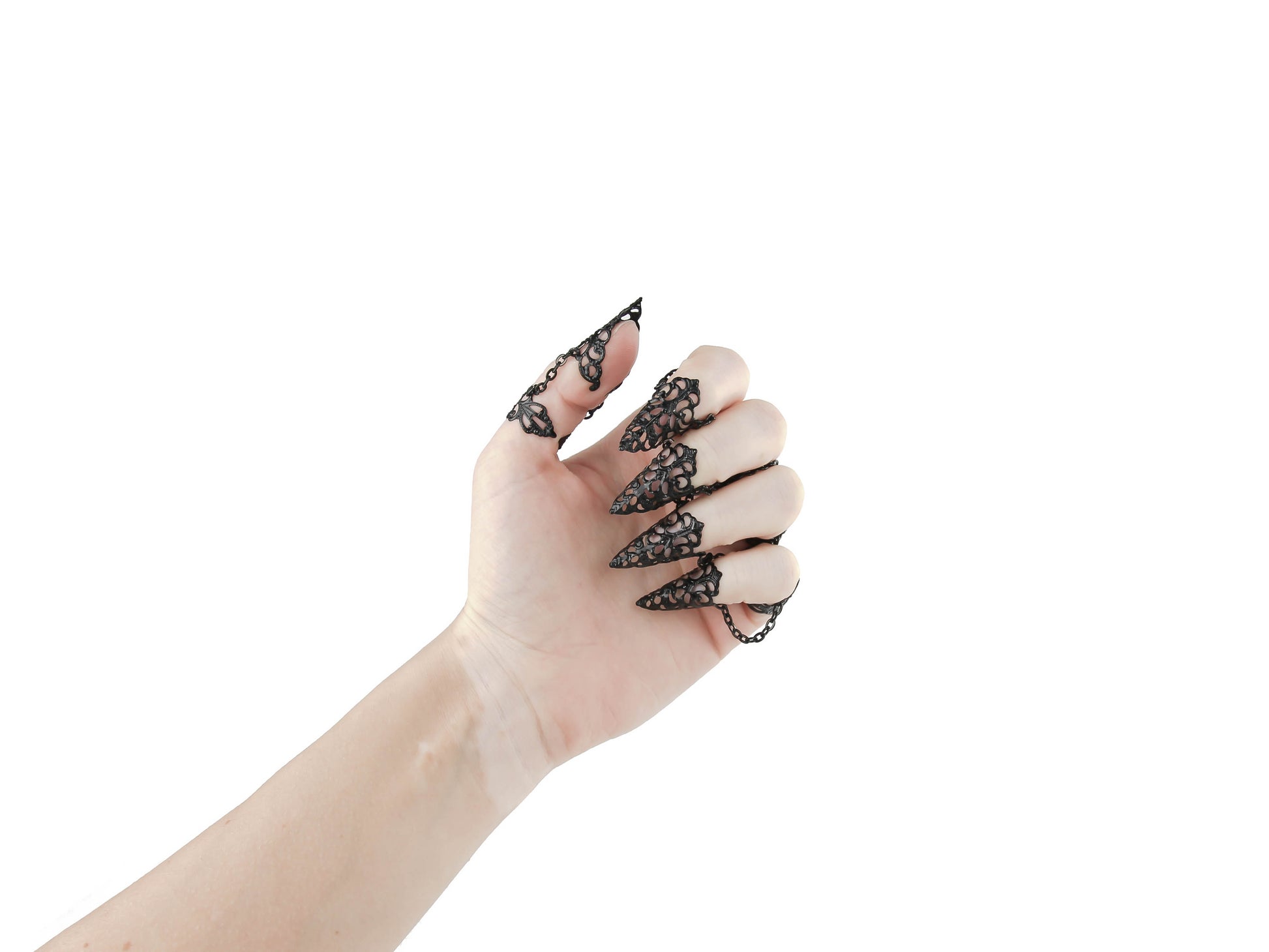  A sophisticated full hand set of Myril Jewels claw rings, exquisitely designed for the dark-avantgarde enthusiast. The intricate filigree work of the black rings creates a stunning contrast that captures the essence of Neo Gothic style. Ideal for gothic-chic attire, Witchcore ensembles, or as a striking addition to minimal goth daily wear. This set is a perfect choice for those seeking standout Halloween or festival jewelry, embodying the bold spirit of punk and rave party fashion