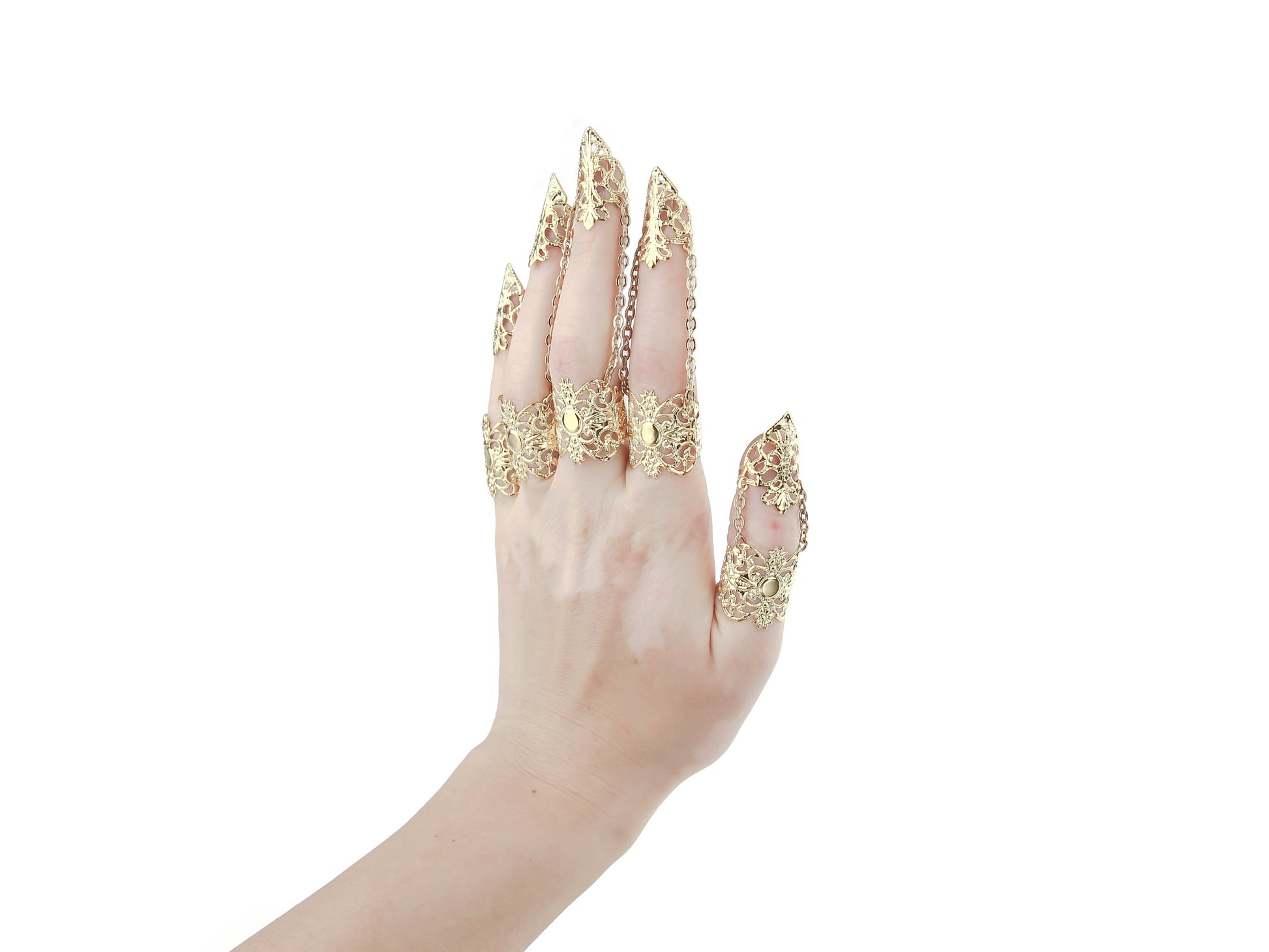 A hand elegantly displays Myril Jewels' full set of intricate gold rings with nail claws, perfect for neo-gothic style enthusiasts. The exquisite craftsmanship is ideal for Halloween, punk fashion statements, or as a standout accessory for whimsigoth and witchcore looks, also making a memorable gift for a goth girlfriend.