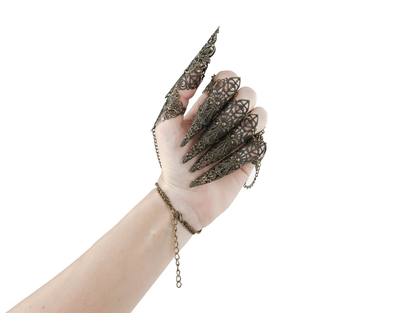 Unleash your inner gothic fashionista with this intricately designed claw glove crafted from delicate bronze filigree. Each finger features a dramatic, clawed tip, making it the perfect accessory for any goth jewelry enthusiast. The addition of chain links and a lace-patterned metalwork adds to the ornate appeal of this unique piece.