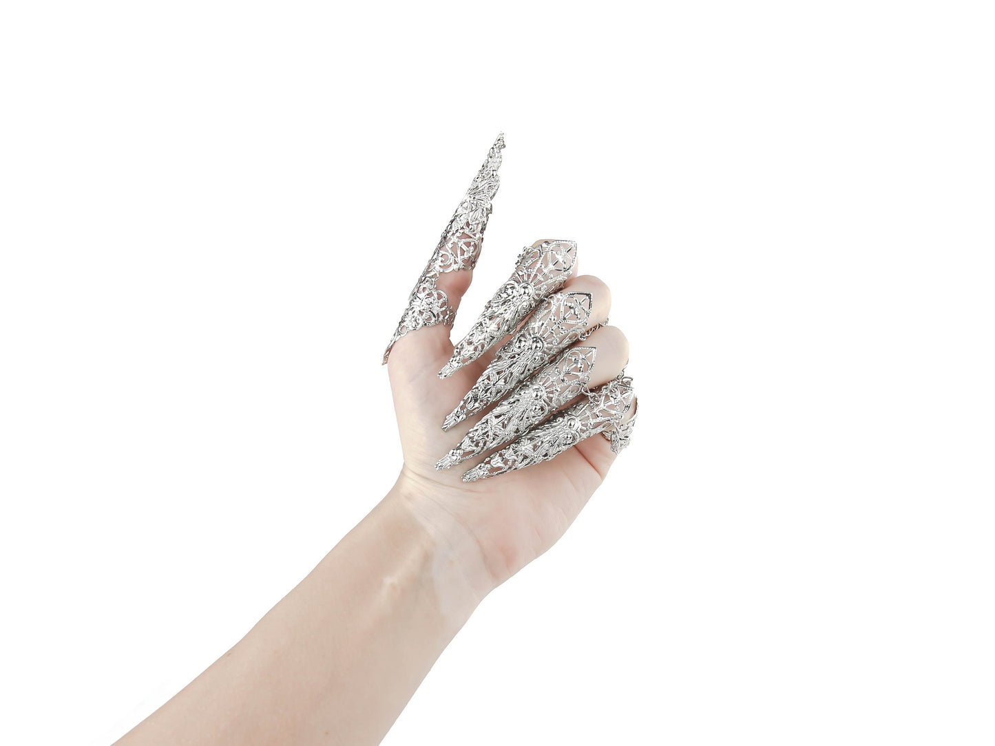 Captured is a full hand set of Myril Jewels claw rings, each piece flowing into long, slender claws that evoke the essence of neo-gothic design. These silver filigree rings, perfect for dark avant-garde enthusiasts, are an impeccable choice for enhancing Halloween attire, gothic-chic fashion, or making a bold statement at rave parties, festivals, or in a drag queen's dazzling ensemble.