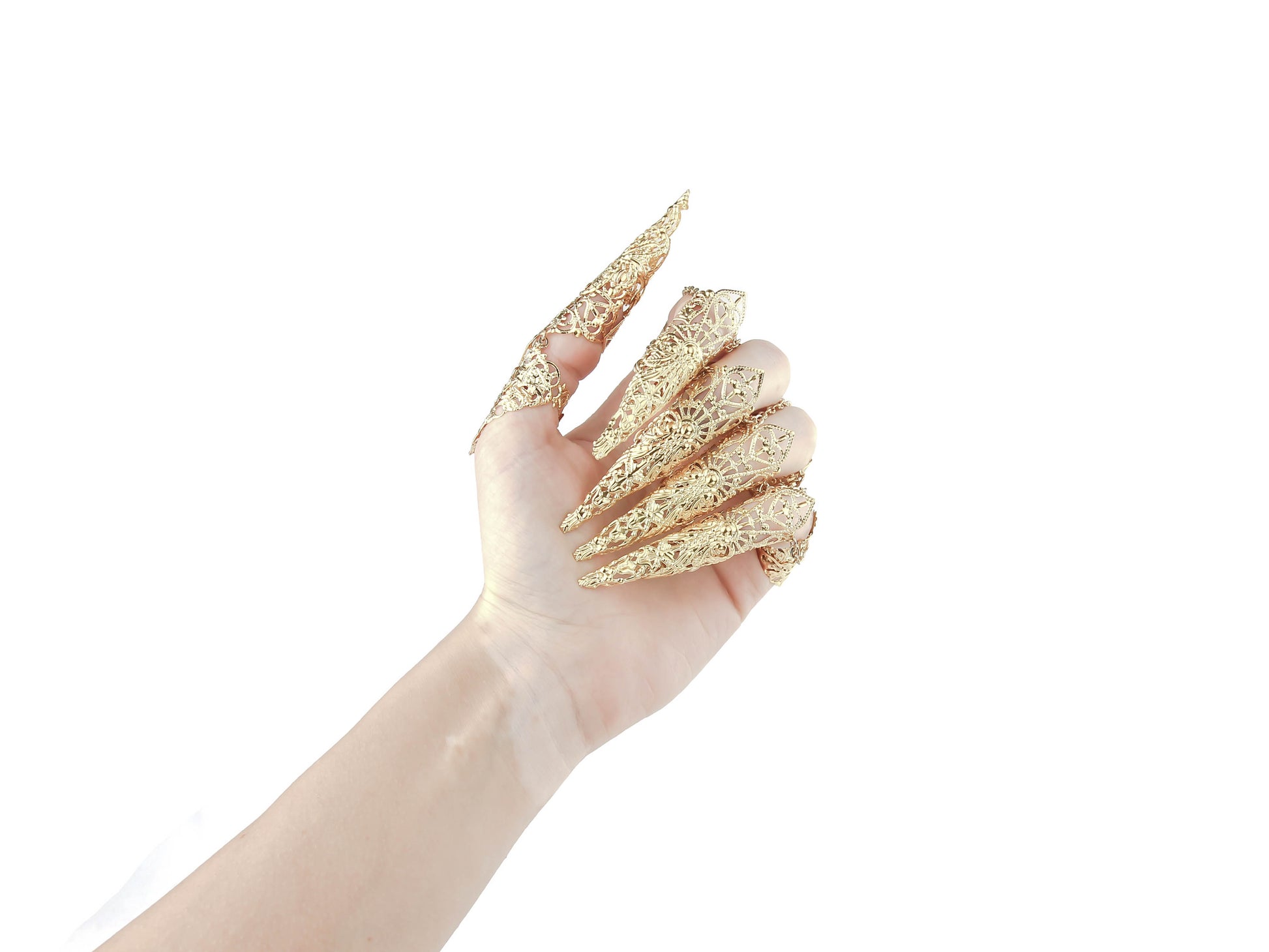 A hand showcases a full set of Myril Jewels' armored rings, each extending into long, ornate claws that embody the essence of neo-gothic artistry. These gold claw rings, perfect for gothic, punk, and witchcore enthusiasts, are versatile for Halloween, everyday dark avant-garde fashion, and standout pieces for rave or festival wear, as well as bold drag queen statements.