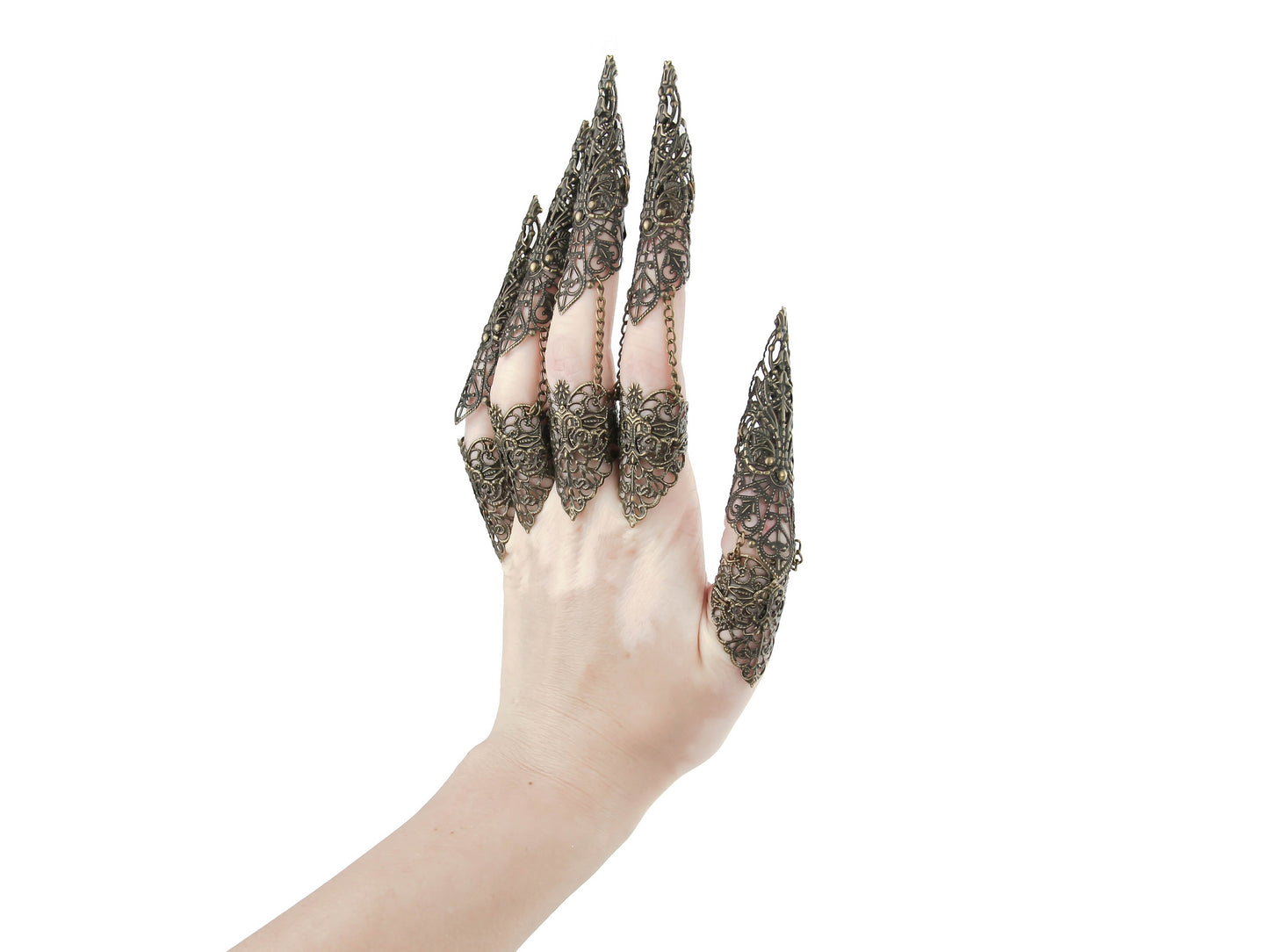 A hand is adorned with a full set of Myril Jewels bronze armor rings, each extending into elaborate long claws that showcase a fine lace-like filigree. This exquisite craftsmanship blends neo-gothic style with dark avant-garde elegance, perfect for Halloween, drag queen shows, or as a standout accessory for those who favor punk jewelry, gothic-chic, and witchcore aesthetics in their everyday and festival wear