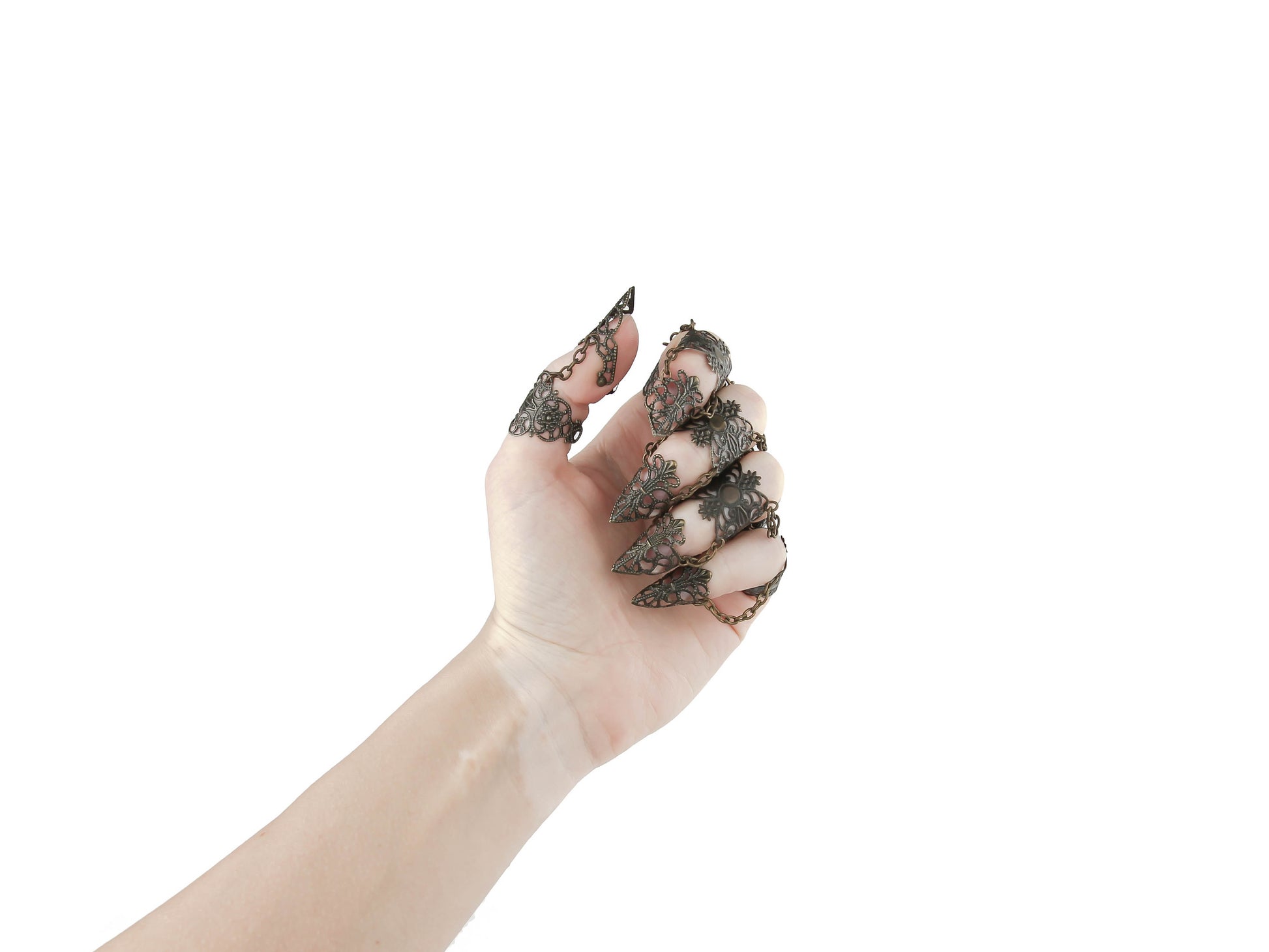 Dramatic full finger bronze claw ring set from Myril Jewels, with ornate filigree details perfect for neo-goth style lovers. These striking pieces add a bold statement to any Halloween or festival look, ideal for those who embrace witchcore, minimal goth, and gothic-chic aesthetics for everyday wear or as a unique gift