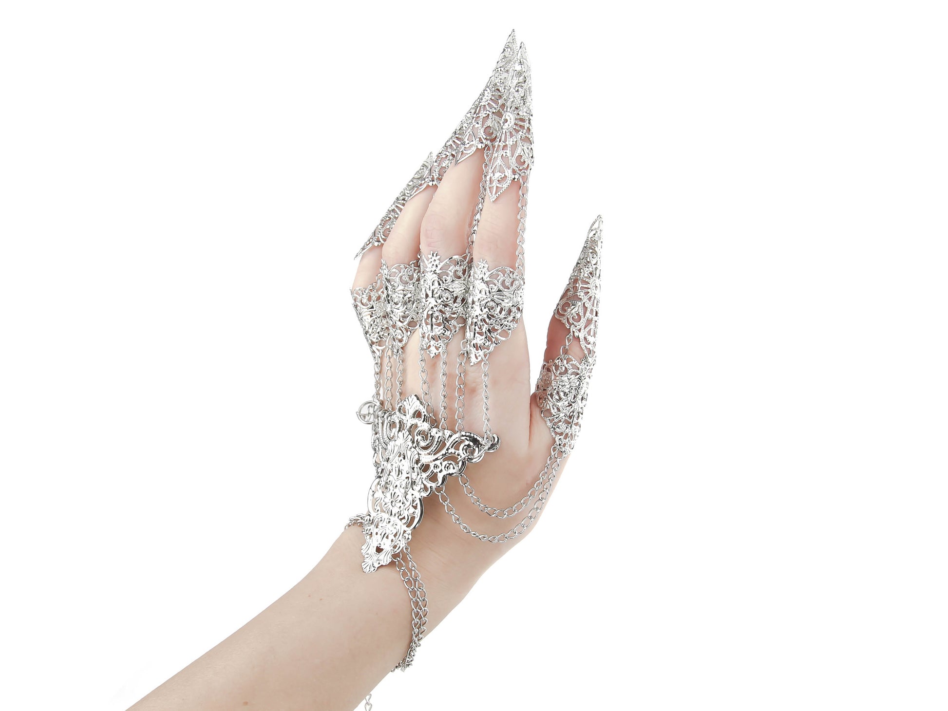 A hand dons a striking metal glove with finger claw rings, intricately designed by Myril Jewels. It's a blend of gothic-chic and neo-goth finesse, perfect for those seeking bold witchcore jewelry to accent their Halloween ensemble or to make a statement at a rave party