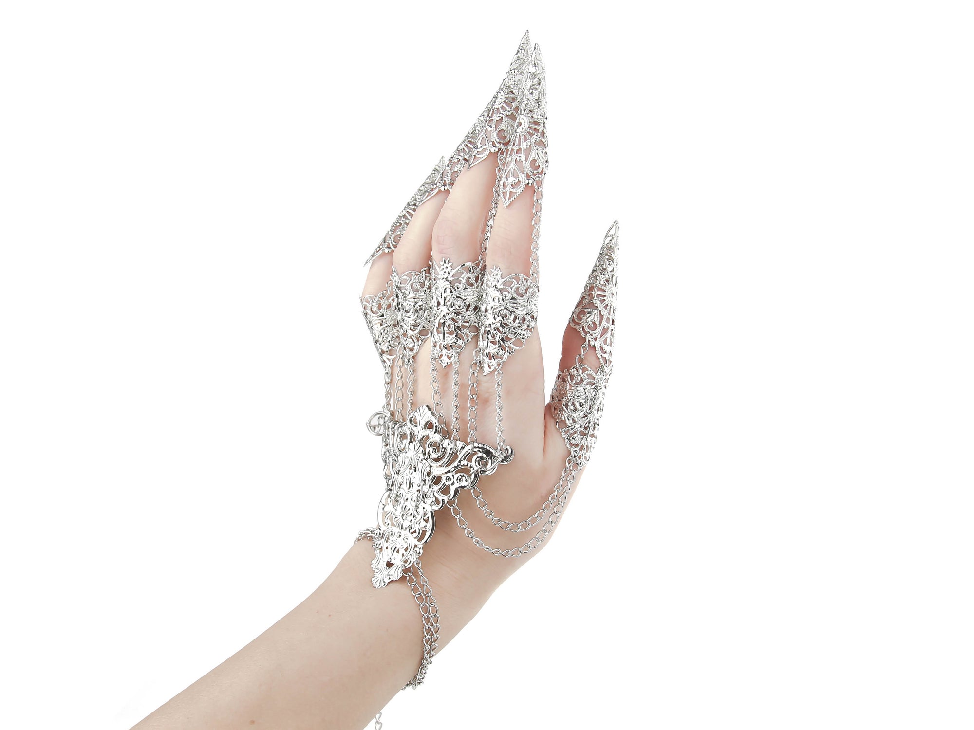 A hand dons a striking metal glove with finger claw rings, intricately designed by Myril Jewels. It's a blend of gothic-chic and neo-goth finesse, perfect for those seeking bold witchcore jewelry to accent their Halloween ensemble or to make a statement at a rave party