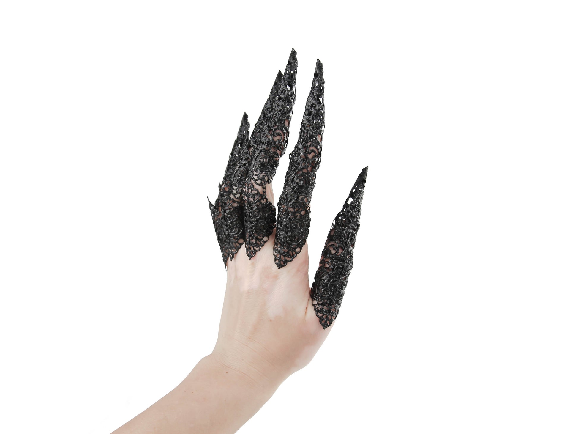 A hand is adorned with a full set of intricate, silver full-finger black claw rings extending into long nail claws, encapsulating a neo-goth aesthetic. These bold, dark-avantgarde pieces from Myril Jewels offer a unique Halloween or everyday wear option for gothic and alternative style enthusiasts seeking festival or rave party jewelry.