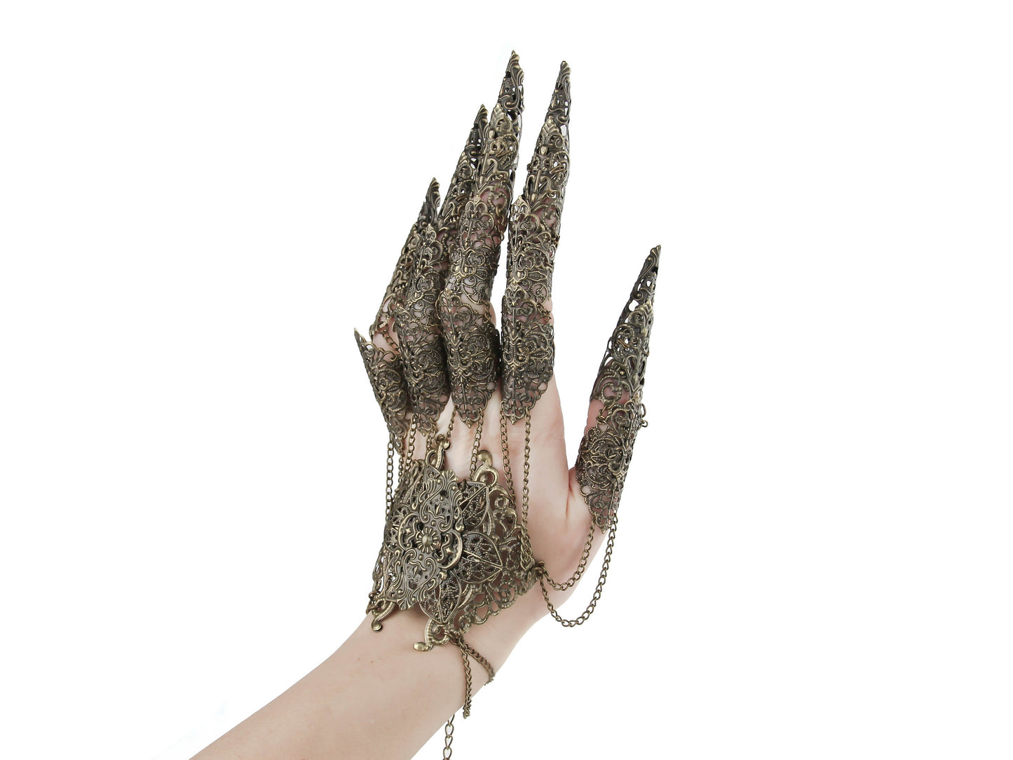 An ethereal display of Myril Jewels' handcrafted bronze lace-like metal finger armor rings, perfect for gothic-chic, witchcore, and whimsigoth enthusiasts. These neo-gothic statement pieces are interconnected with delicate chains, ideal for Halloween or any punk-inspired fashion statement, showcasing the unique artistry of alternative style jewelry.