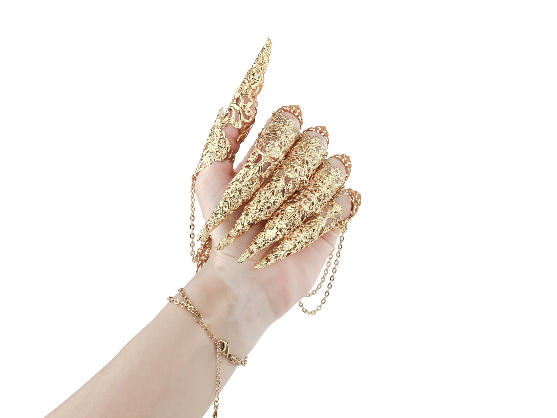 A dramatic display of Myril Jewels' gold finger armor rings, intricately designed with a gothic-chic pattern, enveloping the hand in a statement of dark elegance. Ideal for gothic, punk, or witchcore fashion, they're a captivating choice for Halloween and neo-gothic events.