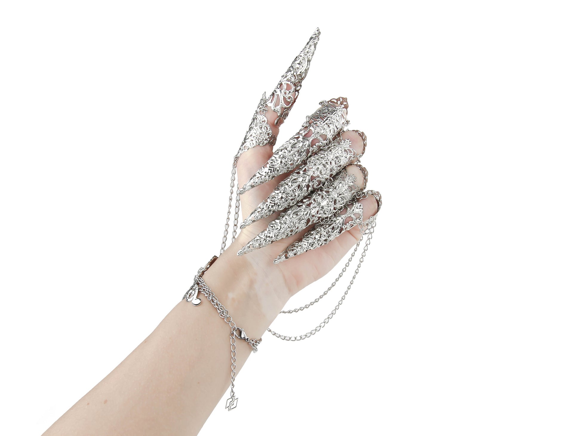 An intricately designed silver metal glove with full finger claw rings by Myril Jewels, embodying the spirit of dark avant-garde fashion. A perfect accessory for goth enthusiasts or a bold statement for festival and rave wear, blending witchcore with neo-gothic craftsmanship