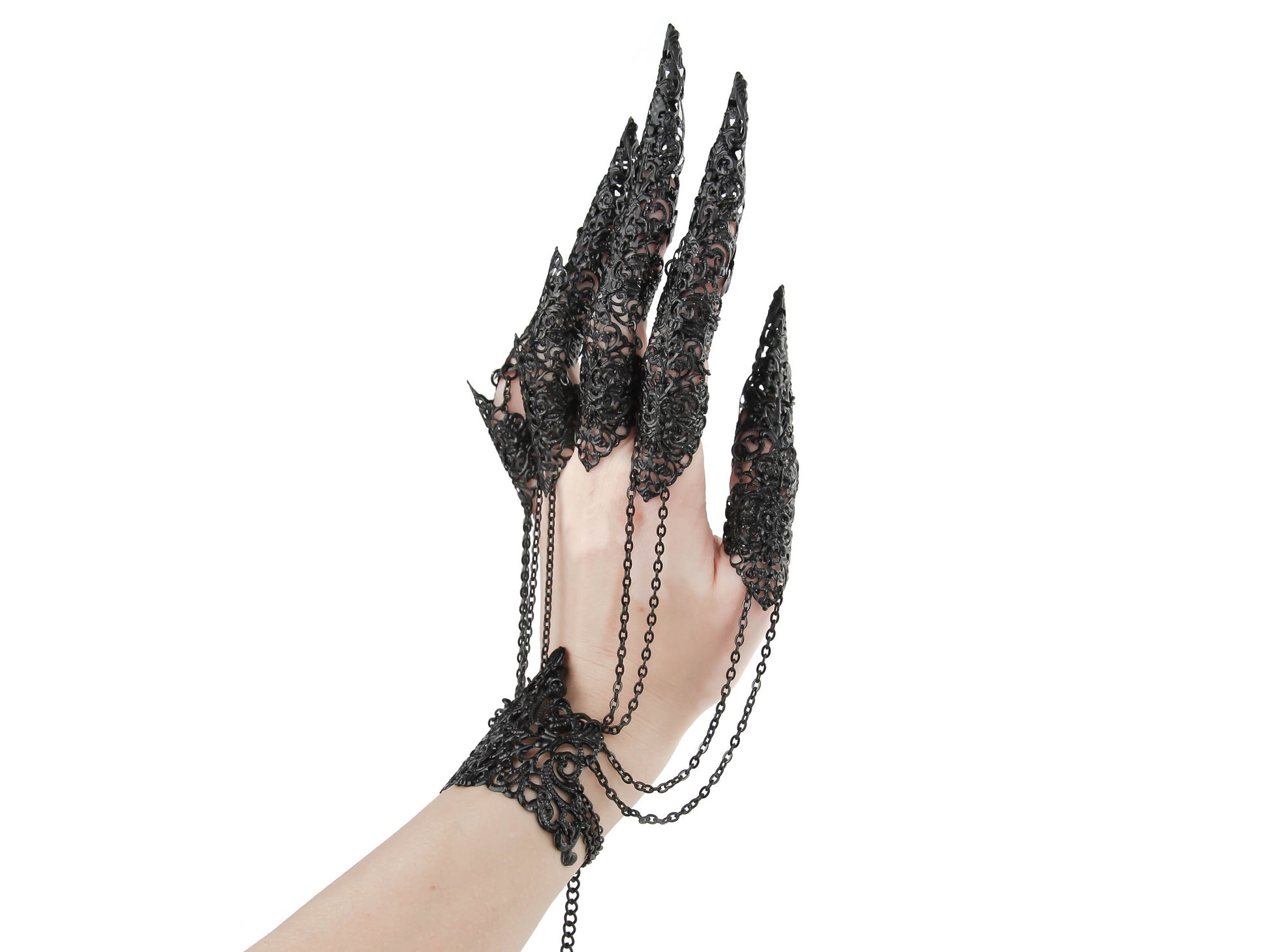 This striking black metal glove with full finger claw rings by Myril Jewels exemplifies gothic opulence. Perfect for a dramatic Halloween or punk ensemble, its intricate design is ideal for those who embrace a bold, neo-gothic style, from festival outfits to drag queen glamour, or as a standout gift for the darkly inclined