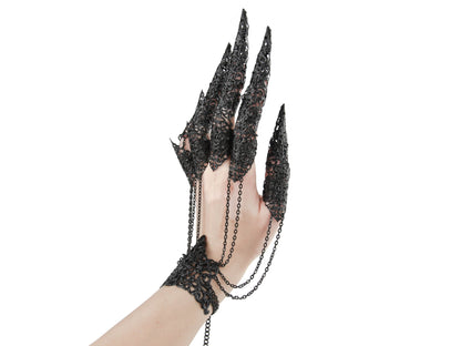 This striking black metal glove with full finger claw rings by Myril Jewels exemplifies gothic opulence. Perfect for a dramatic Halloween or punk ensemble, its intricate design is ideal for those who embrace a bold, neo-gothic style, from festival outfits to drag queen glamour, or as a standout gift for the darkly inclined