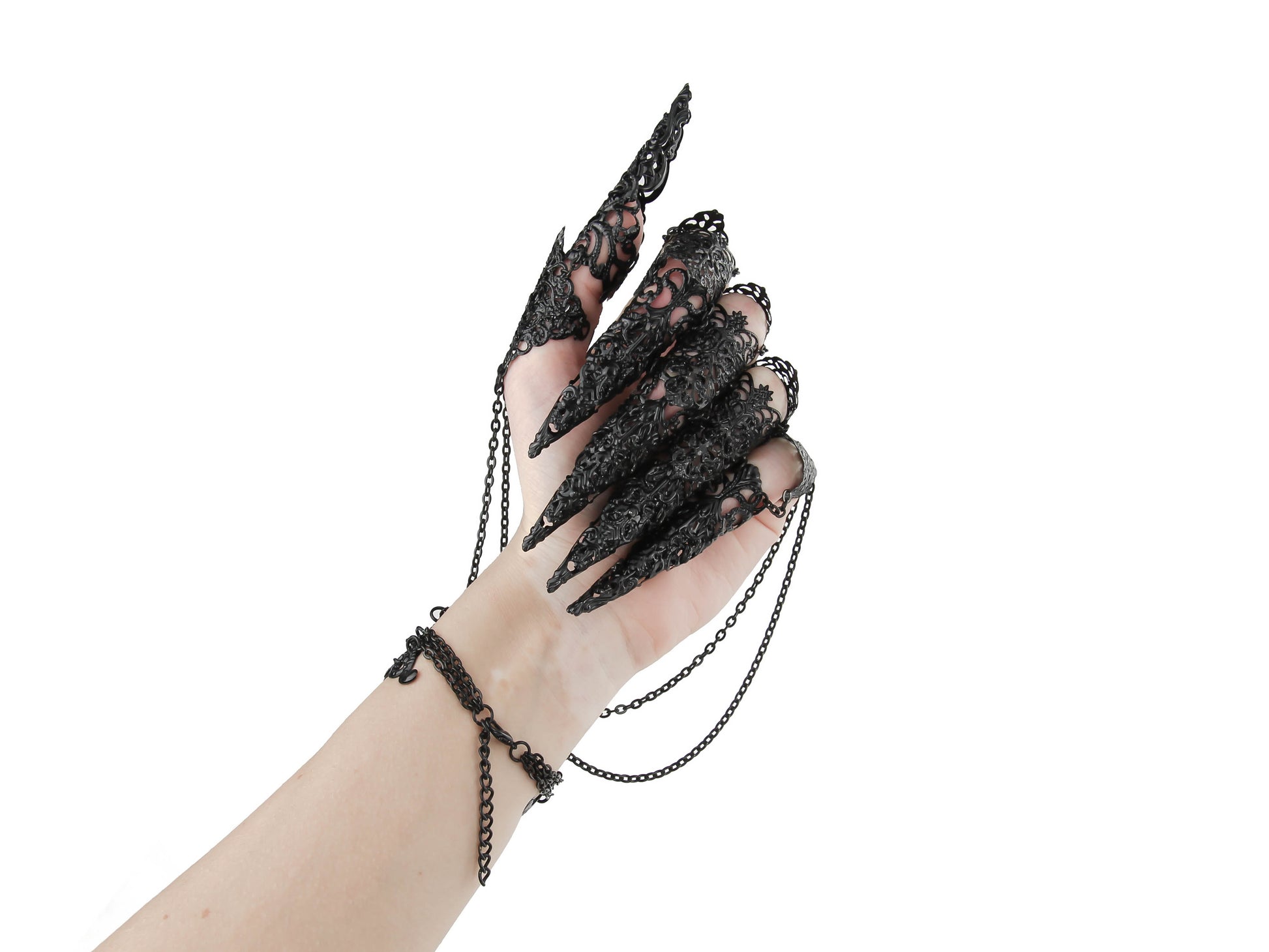 This striking black metal glove with full finger claw rings by Myril Jewels exemplifies gothic opulence. Perfect for a dramatic Halloween or punk ensemble, its intricate design is ideal for those who embrace a bold, neo-gothic style, from festival outfits to drag queen glamour, or as a standout gift for the darkly inclined