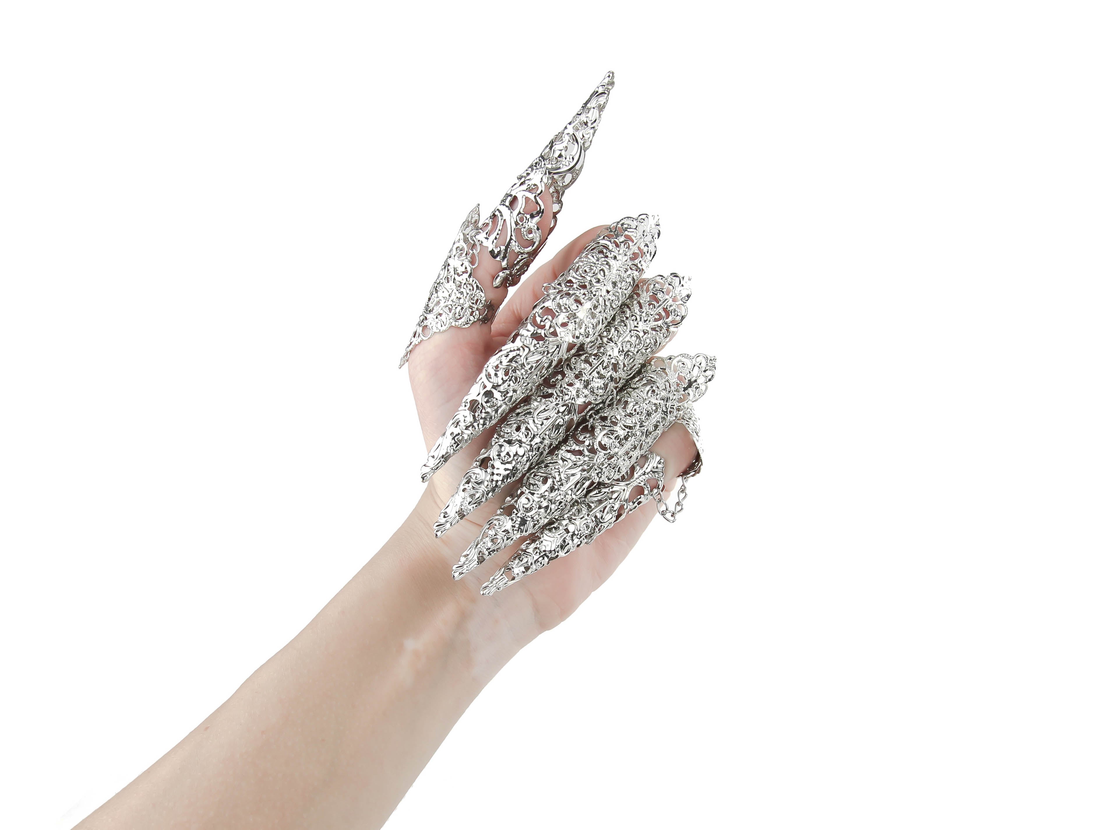 A hand is adorned with Myril Jewels' midi rings, featuring delicate filigree and extended claws. This bold jewelry embodies the dark, avant-garde essence, perfect for neo-gothic or minimal goth fashion statements and Witchcore enthusiasts