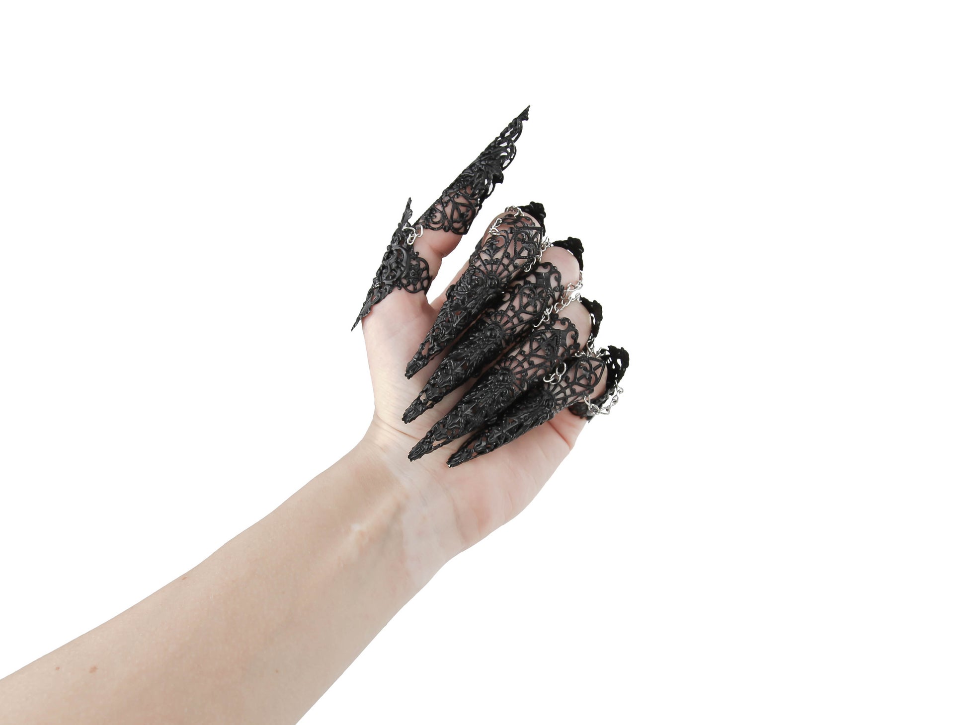 A hand adorned with Myril Jewels' gothic black full-finger rings, extending into elegant long claws, perfect for a dramatic witchcore or neo-gothic look