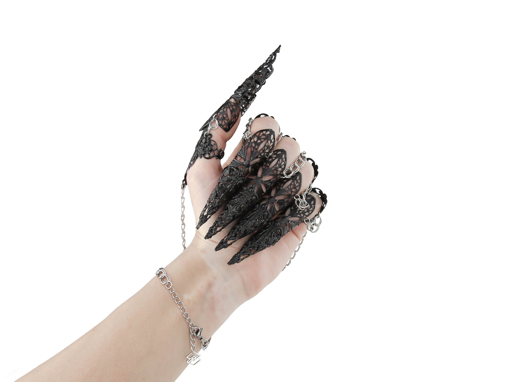 Delve into the realm of Myril Jewels with these exquisite full-hand armored claw rings, intricately designed for the dark avant-garde enthusiast. Perfect for a gothic, alternative look, these rings are ideal for Halloween, embodying Neo Gothic sophistication and punk attitude. They're a dramatic choice for Gothic Lolita, Gothic-chic, whimsigoth, or witchcore aesthetics, and make a powerful statement for drag queens and performers seeking a touch of everyday minimal goth.