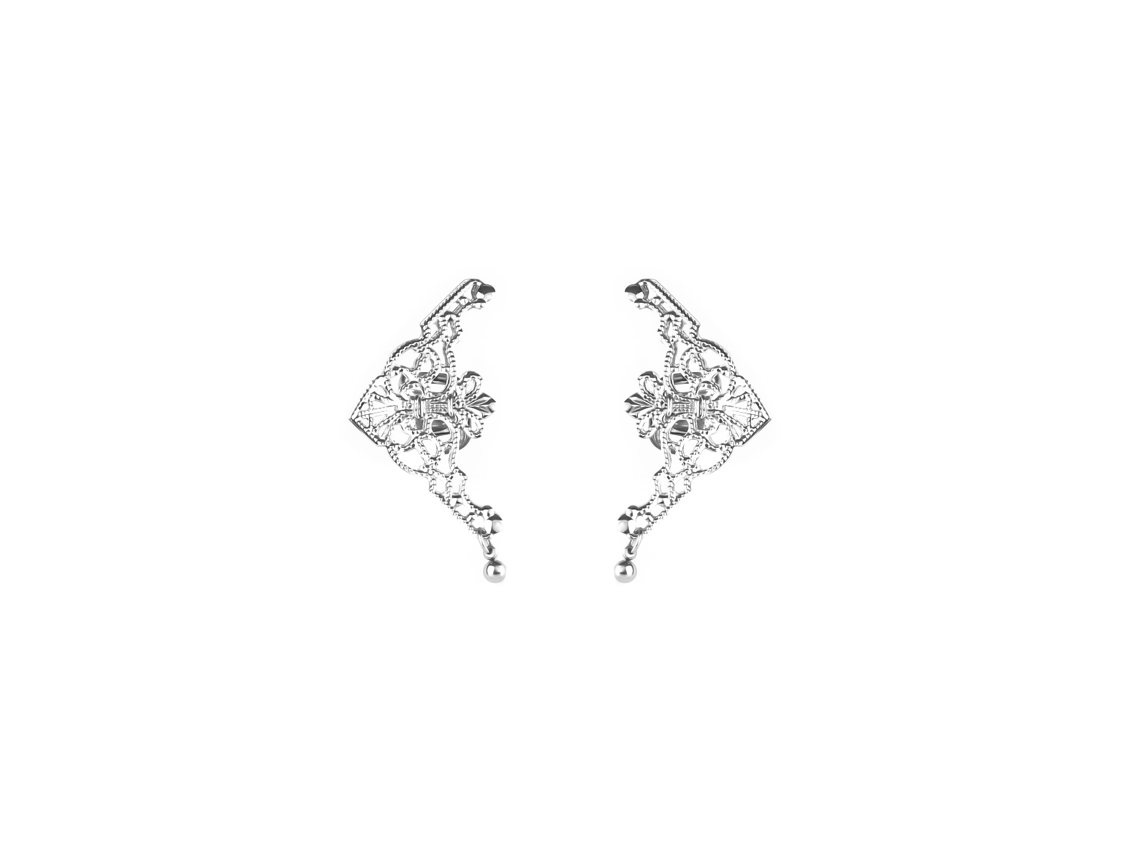 Presenting Myril Jewels' intricate cuff earrings, a masterpiece of neo-gothic design. These silver earrings feature an ornate, web-like pattern with a central floral motif, embodying the gothic-chic aesthetic. They dangle gracefully, perfect for adding a touch of whimsigoth elegance to any ensemble. Ideal for those who favor dark-avantgarde accessories, they're versatile for daily wear or as a highlight for rave party attire, encapsulating the essence of festival jewels with a witchcore twist.