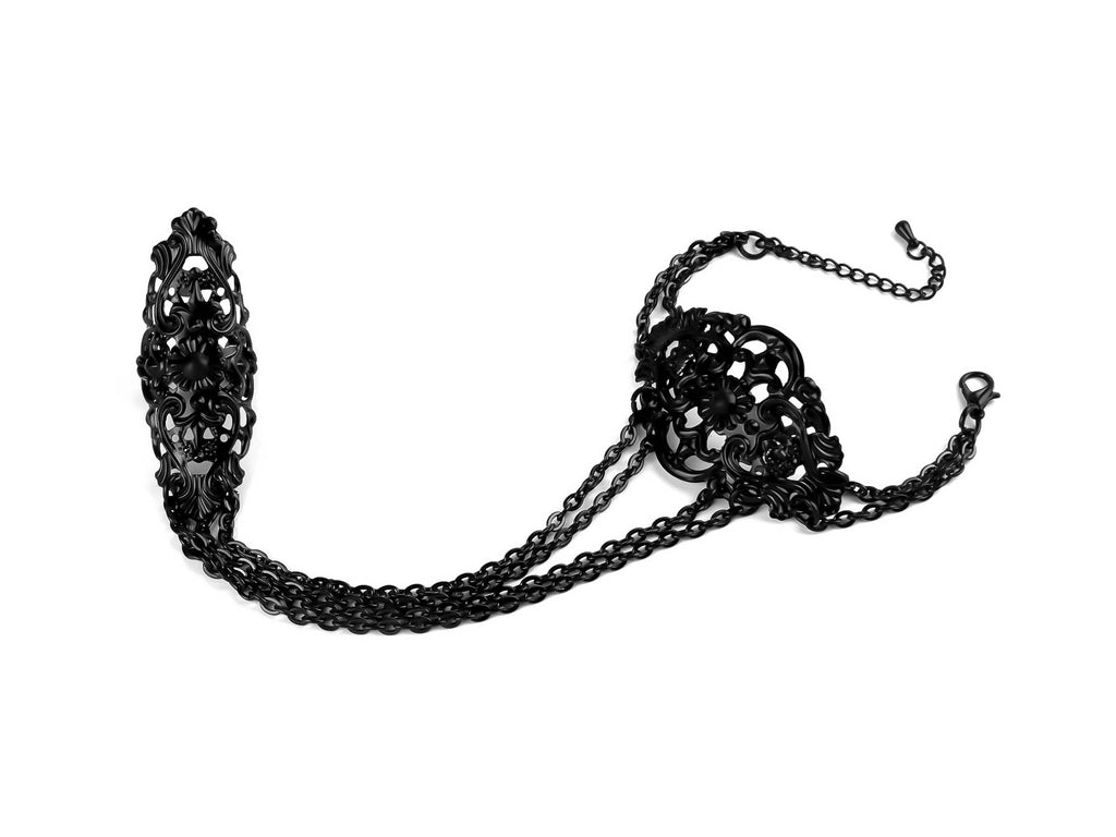 Elegant black articulated bracelet ring with ornate gothic detailing, ideal for adding a sophisticated edge to gothic fashion ensembles or as a statement piece for dark avant-garde jewelry collectors.