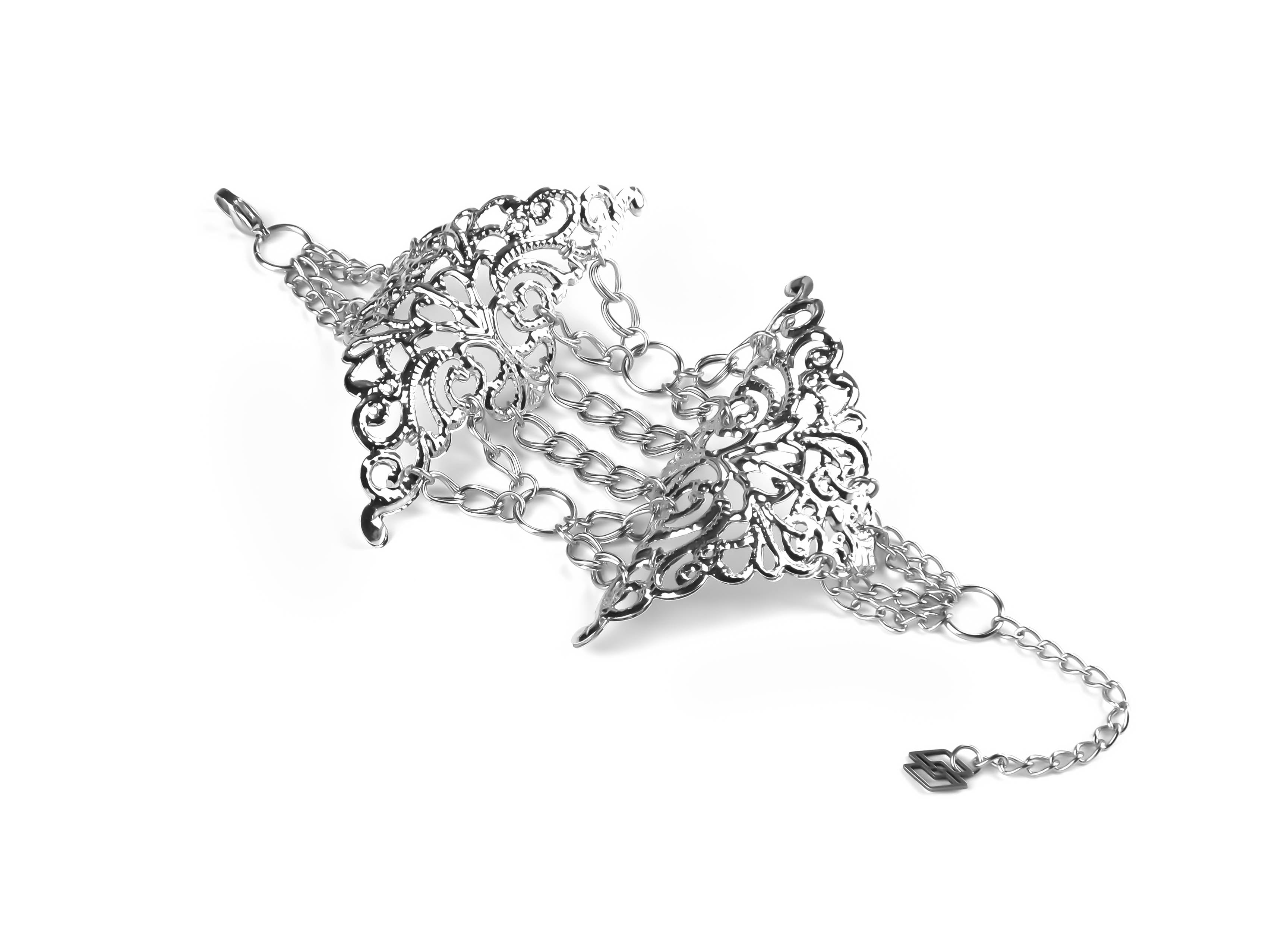 Intricately designed Myril Jewels gothic bracelet featuring detailed silver metal lace patterns and delicate chains, ideal for accessorizing a dark-avantgarde look.