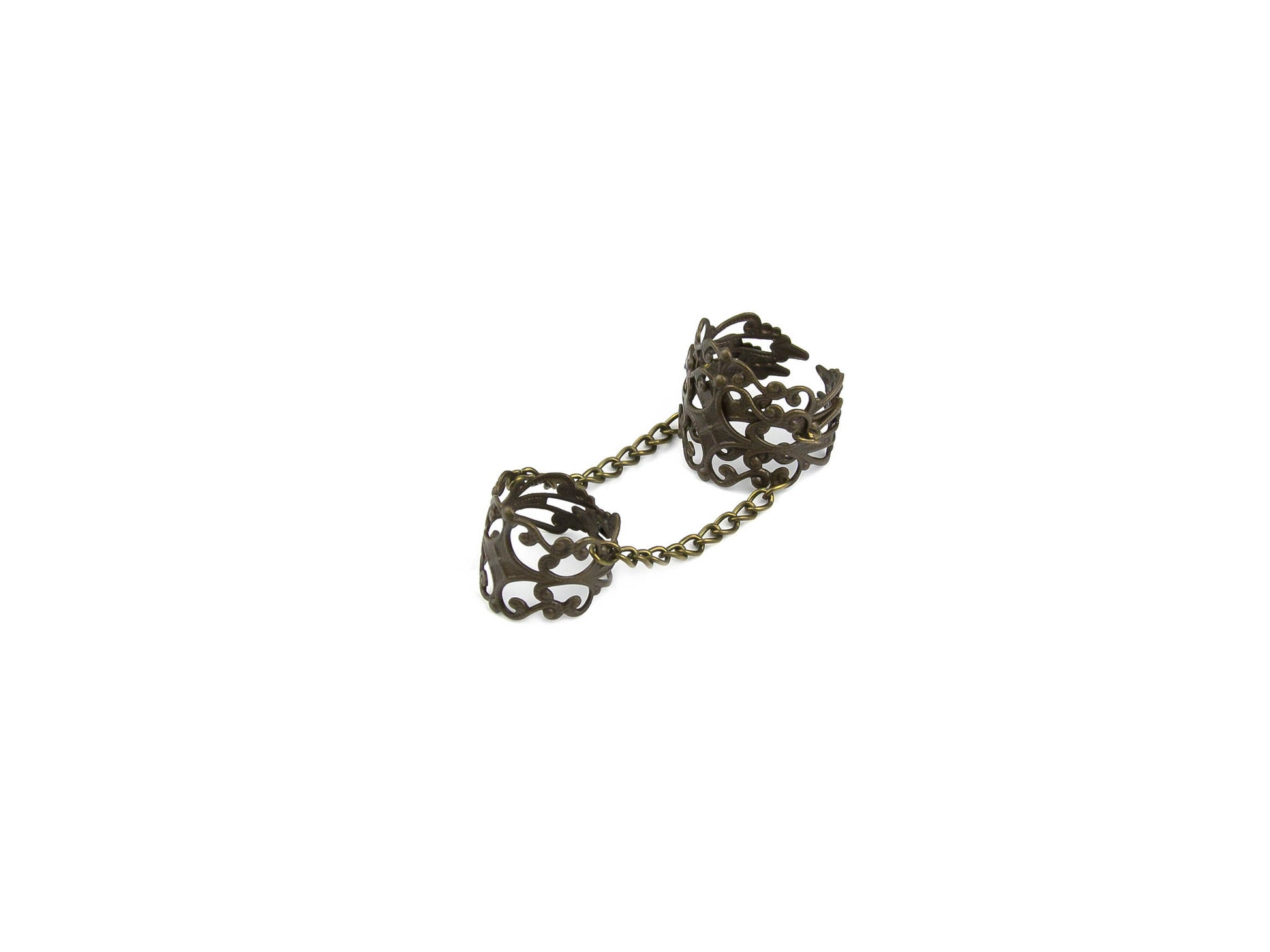 Intricately designed Myril Jewels bronze double ring, connecting two bands with a delicate chain. A statement piece that embodies neo-gothic charm, perfect for Halloween, everyday wear, or as a standout accessory for rave parties. A thoughtful goth girlfriend gift that captures the essence of whimsigoth and bold jewelry.