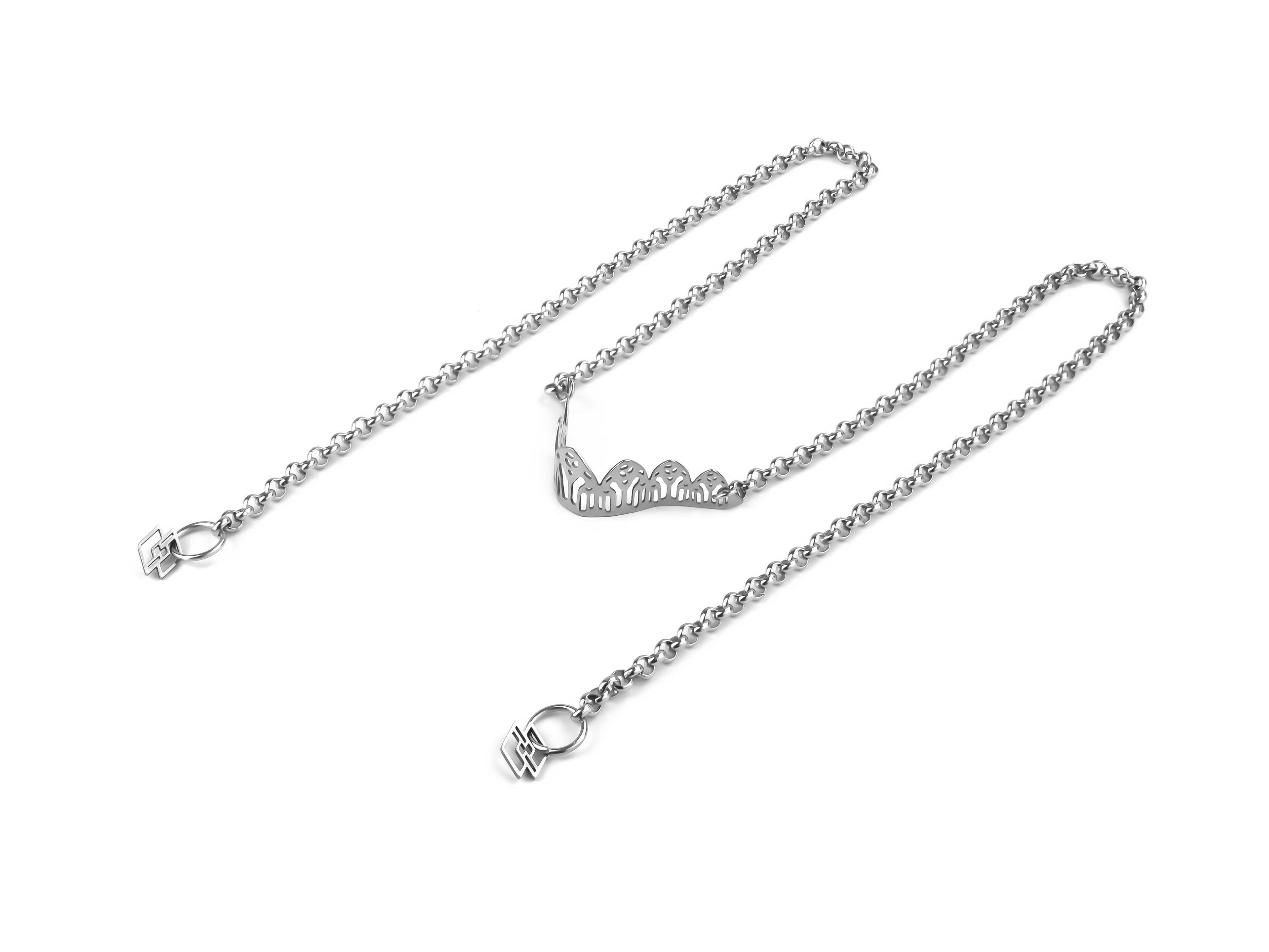 A Myril Jewels nose chain with gothic architecture-inspired filigree, perfect for adding a touch of neo-gothic elegance. This piece is a statement of dark-avantgarde style, suitable for Halloween, everyday wear, and festival fashion for lovers of gothic-chic and witchcore aesthetics.