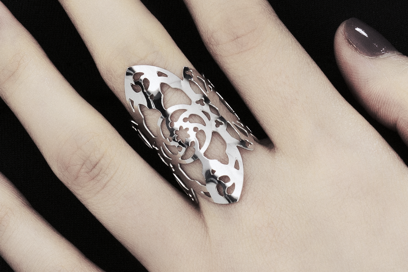 This exquisite Myril Jewels ring, handcrafted with a dark avant-garde flair, features detailed gothic-inspired motifs suitable for aficionados of alternative and gothic fashion. Designed with slender bands that evoke gothic arches, this piece exudes understated elegance. Handmade in Italy, these rings capture Myril Jewels' signature evolving style, crafted for those with a refined appreciation for gothic adornments.