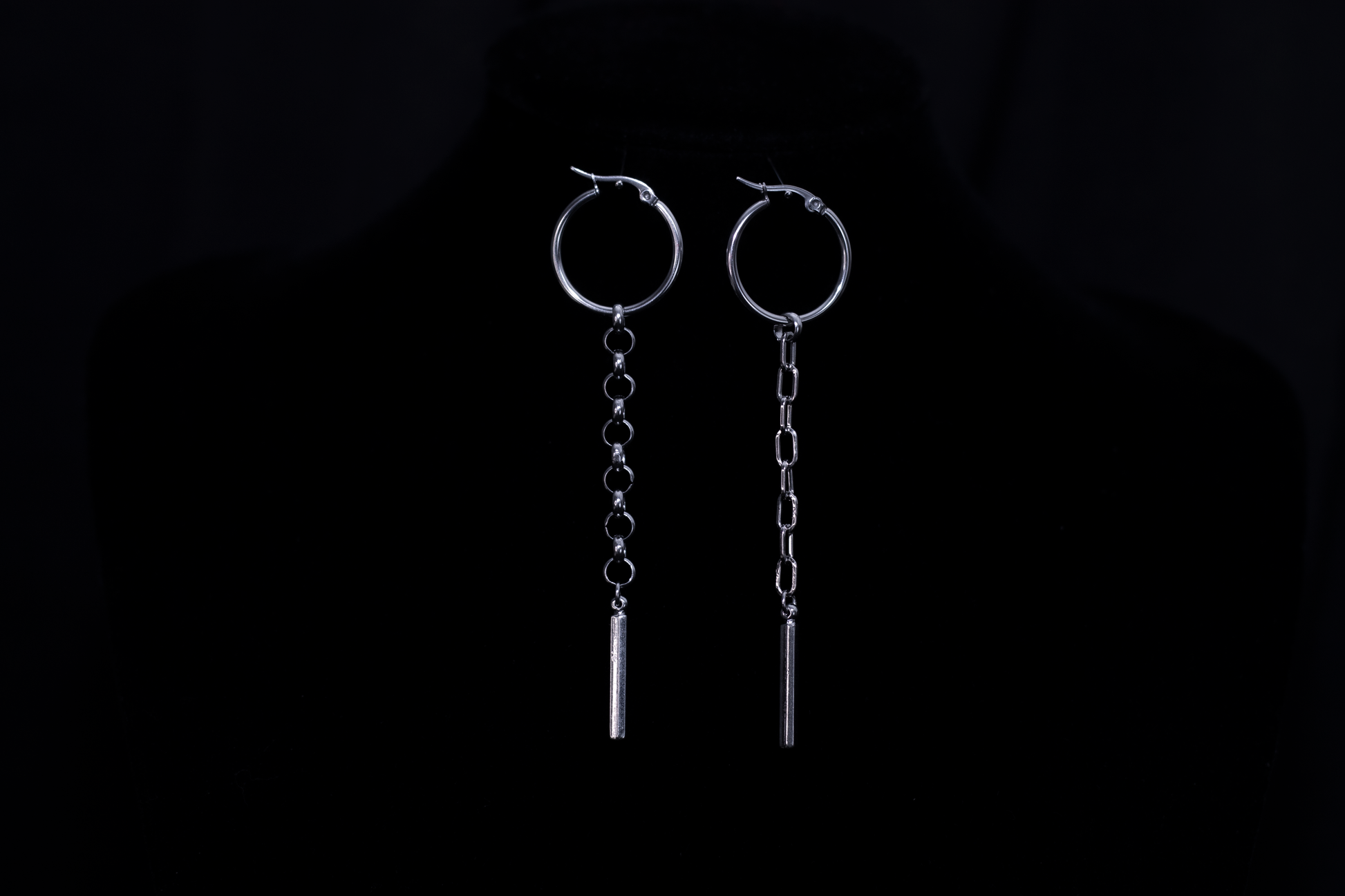Elegant Myril Jewels hoop earrings featuring long chains, encapsulating neo-gothic allure with a dark-avantgarde twist for the gothic style connoisseur. Ideal for diverse occasions from Halloween to everyday wear.