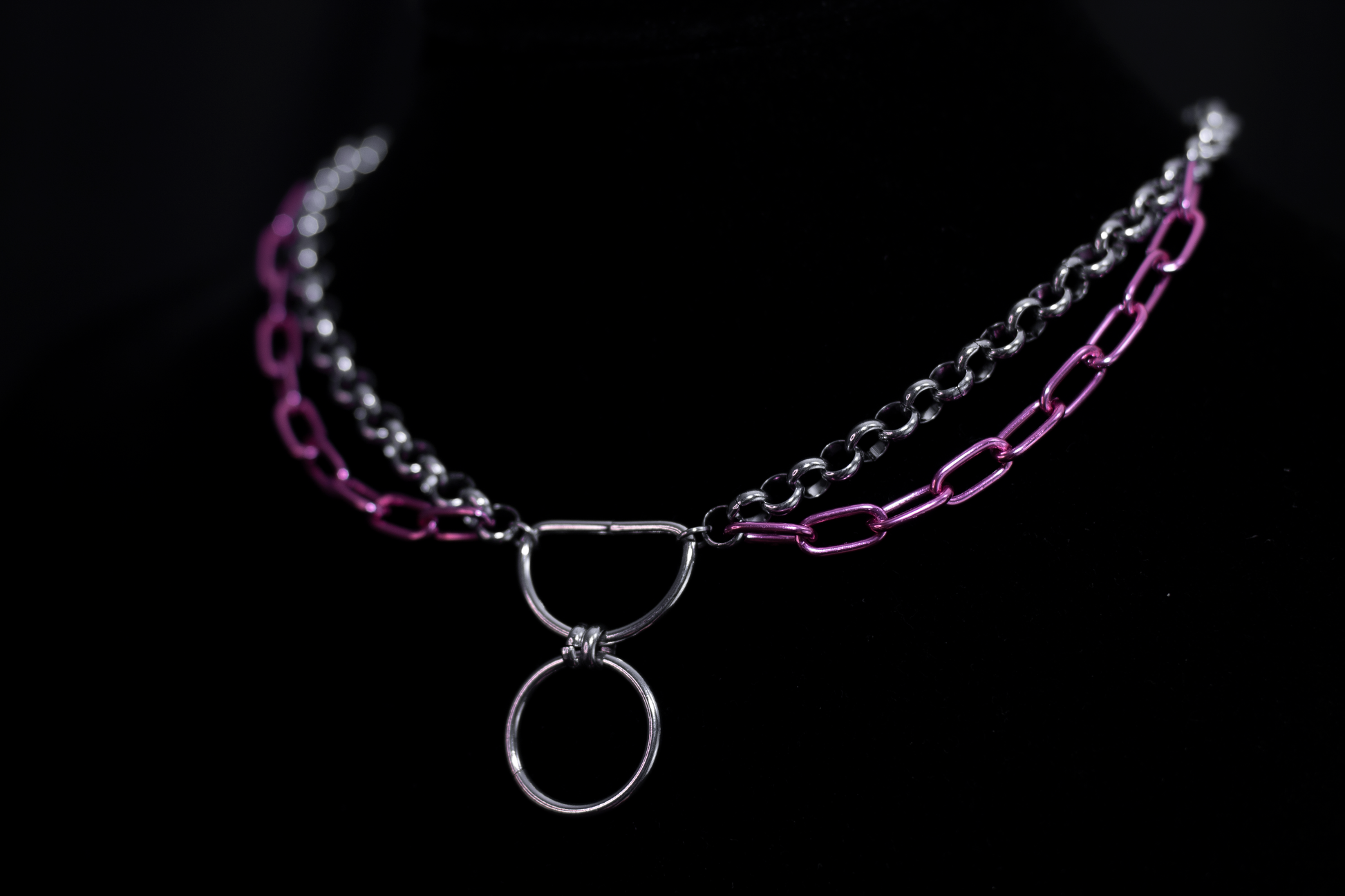 Discover Myril Jewels' unique silver chain necklace accented with striking pink links. A perfect blend of neo-goth elegance and punk edginess, this piece is ideal for adding a bold touch to any outfit, from everyday wear to festival ensembles. Shop now for an exquisite gothic-chic addition to your jewelry collection