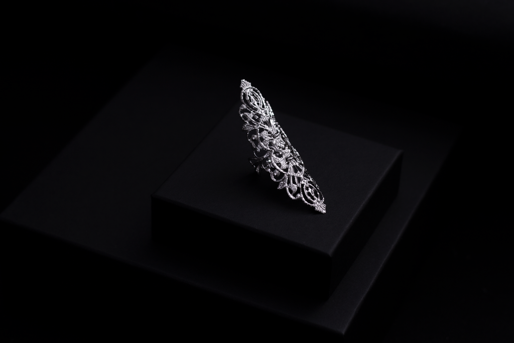 Discover the allure of Myril Jewels with this exquisite wide gothic ring, displayed against a sleek blacl background. This signature piece embodies the essence of neo-gothic jewelry, perfect for goth enthusiasts seeking a bold, witchcore-inspired statement. Ideal for Halloween, rave parties, or as a cherished gift for someone special.