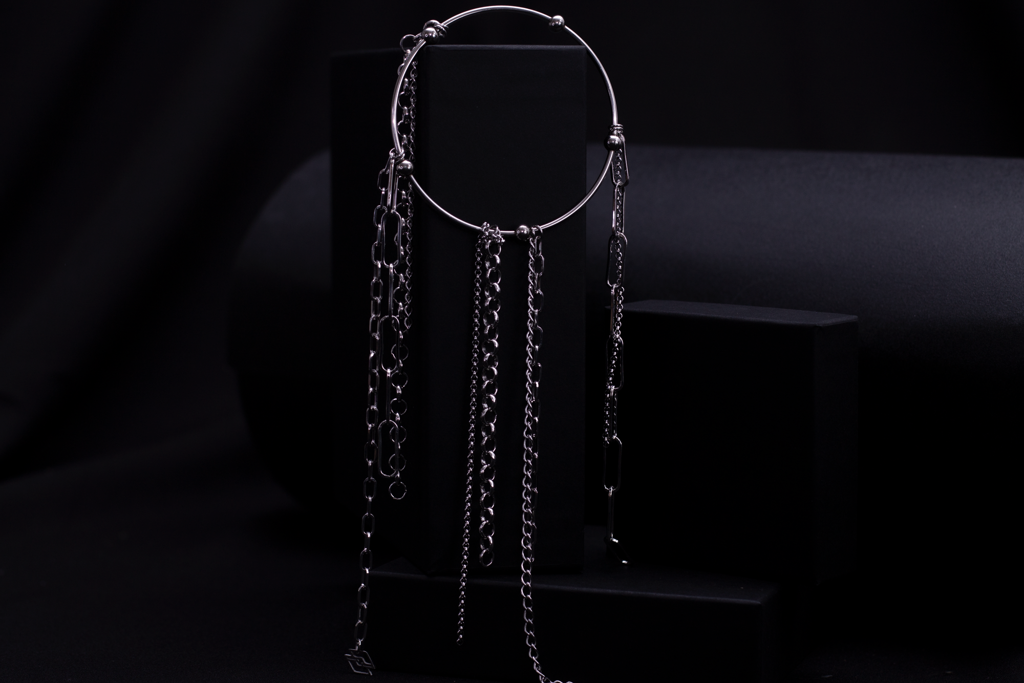 Discover Myril Jewels' neo-goth rigid bracelet with cascading chains, ideal for gothic connoisseurs seeking dark, avant-garde accessories for any edgy ensemble