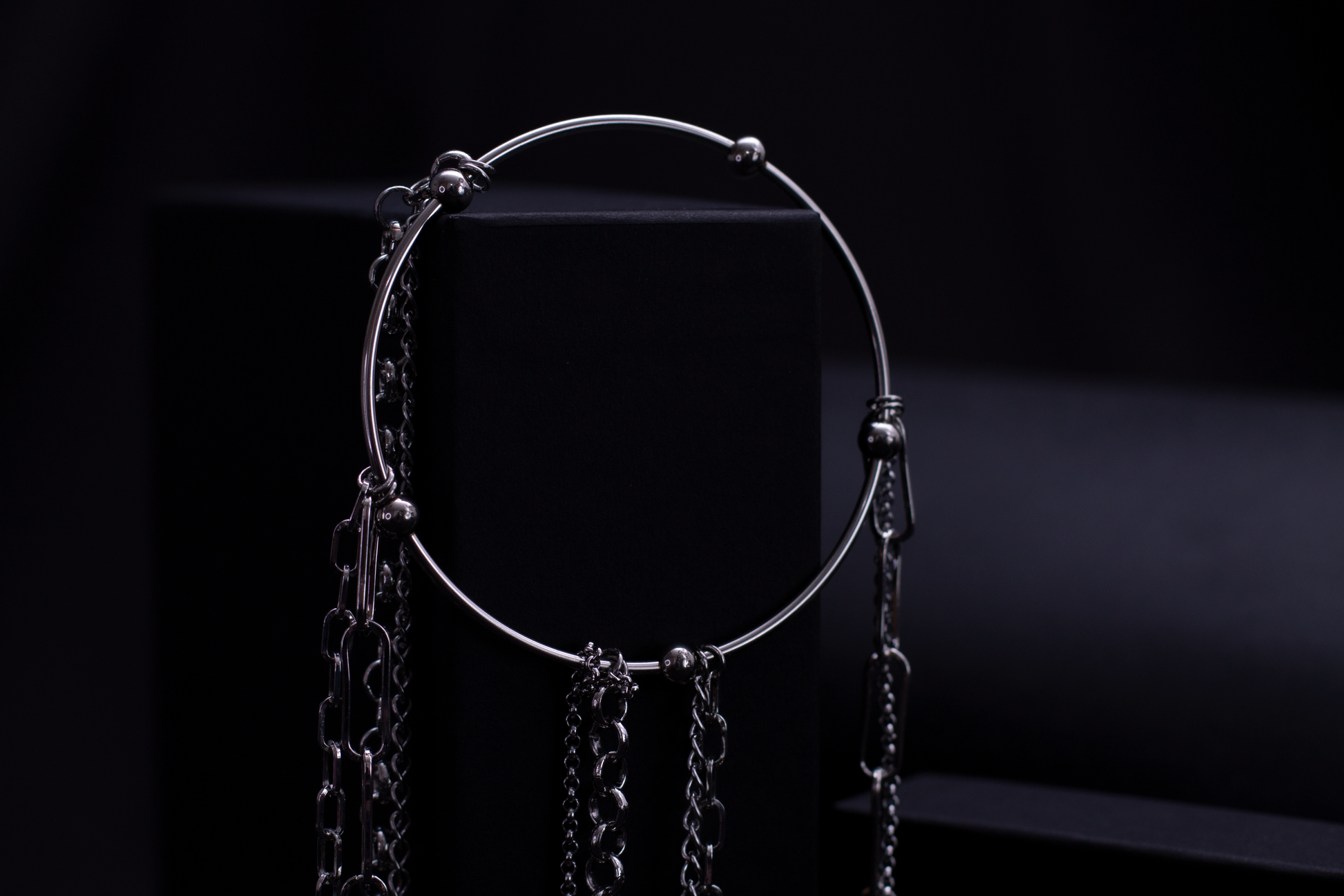 Discover Myril Jewels' neo-goth rigid bracelet with cascading chains, ideal for gothic connoisseurs seeking dark, avant-garde accessories for any edgy ensemble