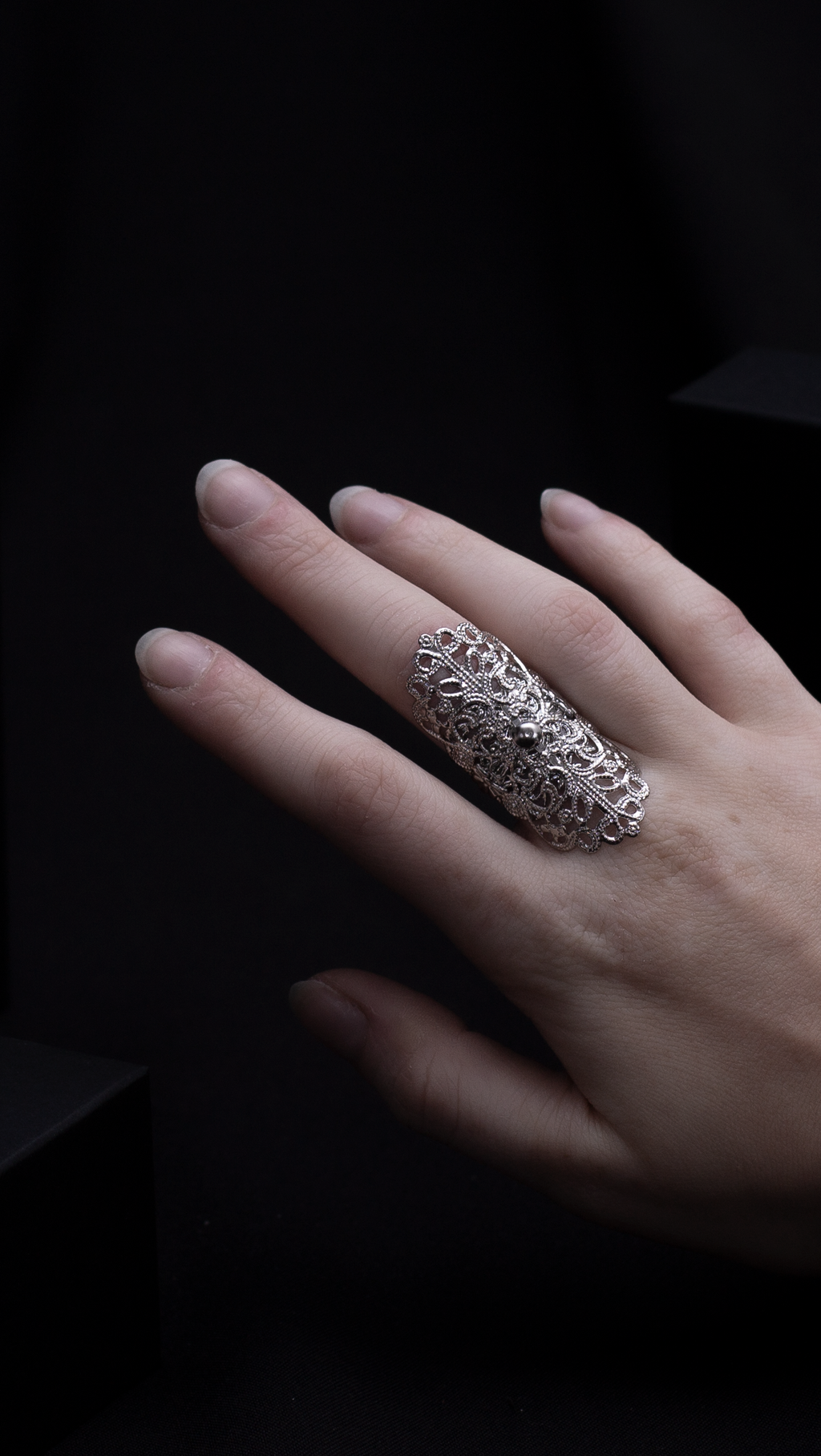 Elegant Myril Jewels oval gothic ring adorning a hand, reflecting a dark, avant-garde aesthetic. With gothic-chic filigree and a witchcore vibe, this piece is a statement of neo-goth jewelry, perfect as a bold accessory for everyday wear, rave parties, or as a distinctive gift for a goth girlfriend or friend.