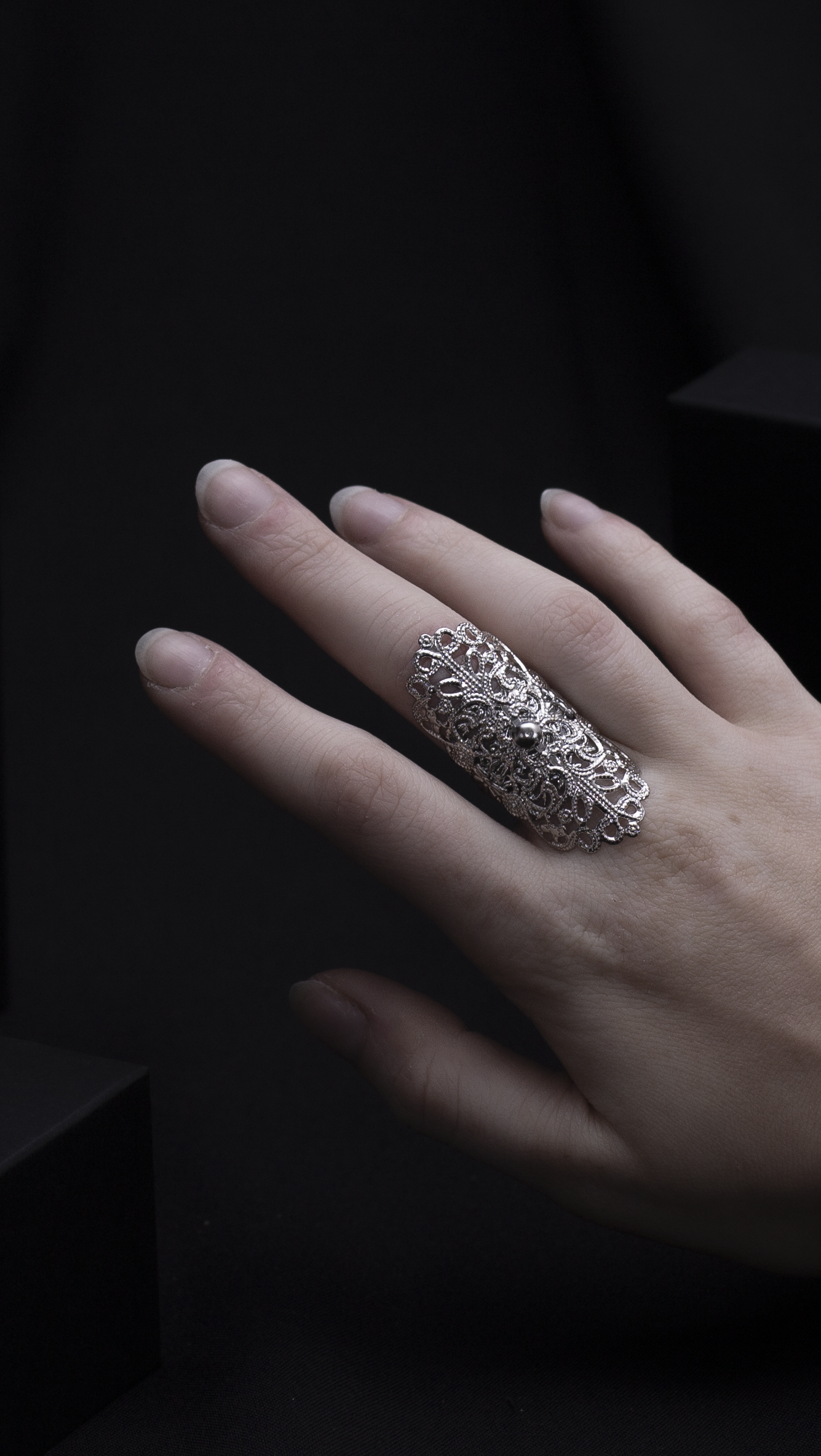 Elegant Myril Jewels oval gothic ring adorning a hand, reflecting a dark, avant-garde aesthetic. With gothic-chic filigree and a witchcore vibe, this piece is a statement of neo-goth jewelry, perfect as a bold accessory for everyday wear, rave parties, or as a distinctive gift for a goth girlfriend or friend.