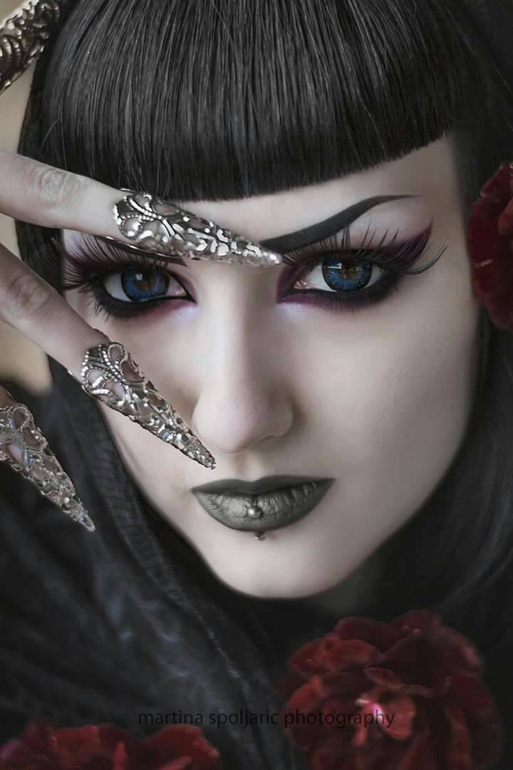 Captivating image featuring intricate long finger claws by Myril Jewels, showcasing their signature neo-goth style. The claws add a dramatic touch to the bold look, making them perfect for Halloween, punk enthusiasts, or as a statement piece for everyday wear by those who embrace goth-chic and whimsigoth fashion