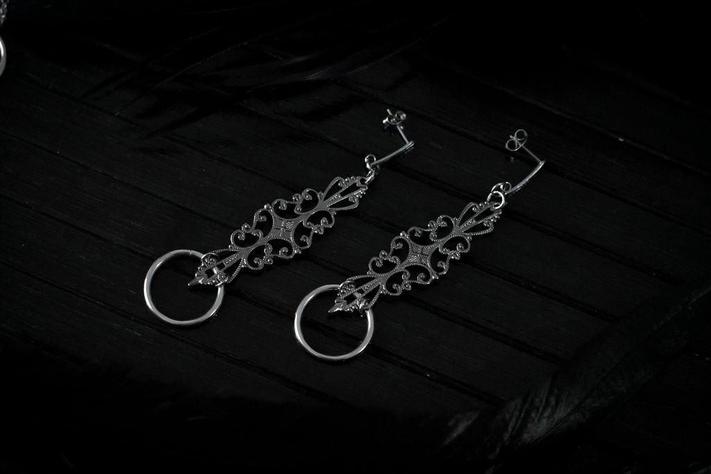 Elegant filigree earrings with O-ring detail from Myril Jewels, reflecting neo-gothic charm for a bold, gothic-chic style statement, perfect for any avant-garde ensemble