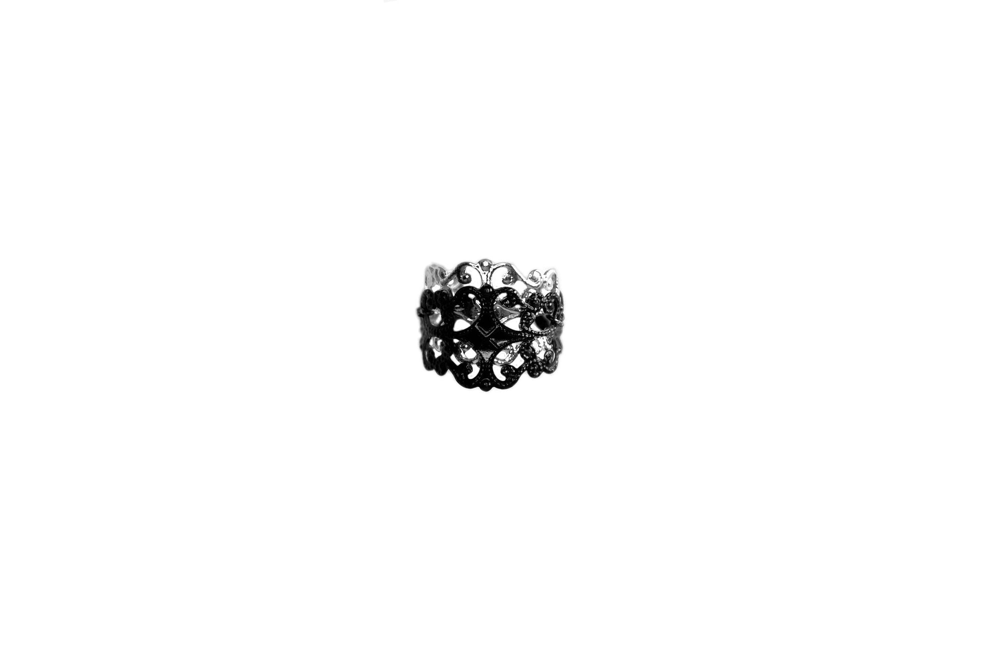 A Myril Jewels signature ring in black and silver, crafted with a bold dark-avantgarde design, merges gothic allure with everyday wear. This Neo Gothic piece, perfect for Halloween, embodies gothic-chic and is an essential accessory for those who embrace Punk, Witchcore, and Whimsigoth styles. Handmade in Italy, it's a sophisticated addition to any alternative jewelry collection.